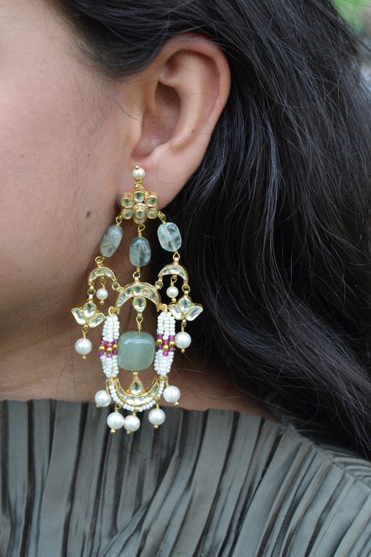 Ardh Chandrika Earrings by House Of Heer with Alloy Metal, Brass, Earrings, Festive Jewellery, Festive Wear, Free Size, Gemstone, Gold, Handcrafted Jewellery, jewelry, July Sale, July Sale 2023, Long Earrings, Natural, Pearl, Polkis, Red, Textured, Vaaruni Gold, White at Kamakhyaa for sustainable fashion