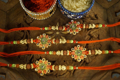 Set of 4-Floral Rudraksh Thread Rakhi by Kamakhyaa with Festive Wear, Floral, Jewellery, Natural Materials, Natural Threads, Rakhi, Rakhis Ready to Ship, Red, Regular Fit, Upcycled, Zari Threads at Kamakhyaa for sustainable fashion