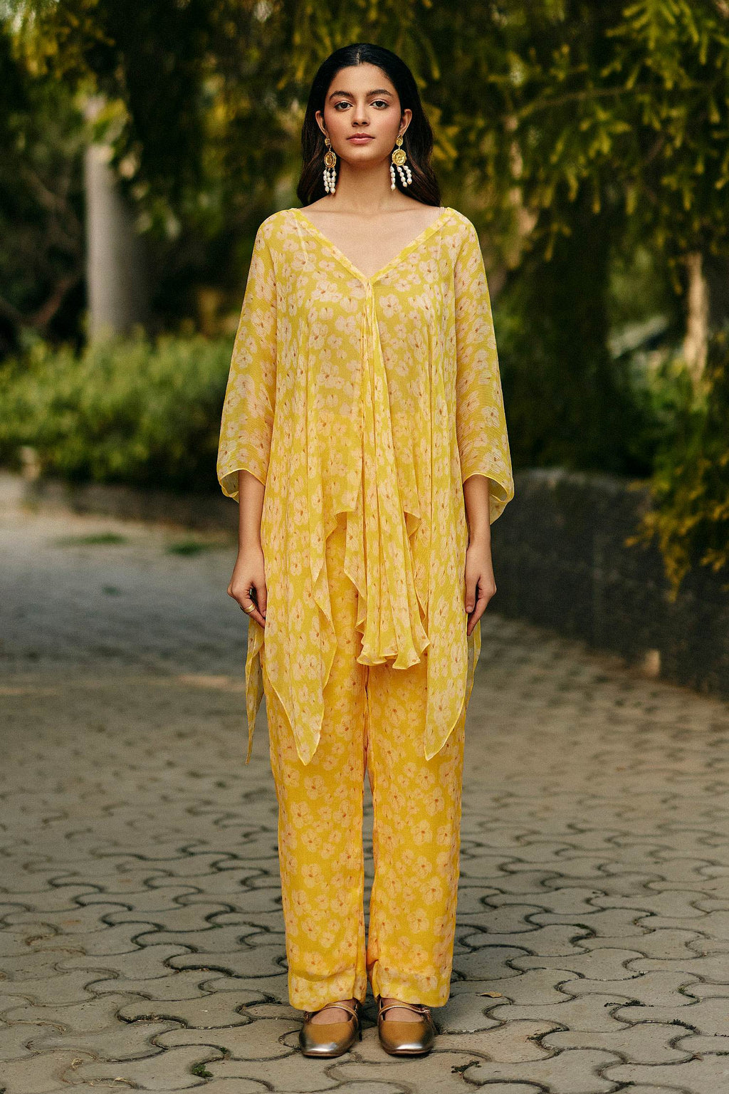 Chiffon Petal Haze Co-ord Set by Ewoke with Chiffon, In Her Element, Nostalgia's Thread by Ewoke, yellow coord set, yellow set, yellow top and trouser at Kamakhyaa for sustainable fashion