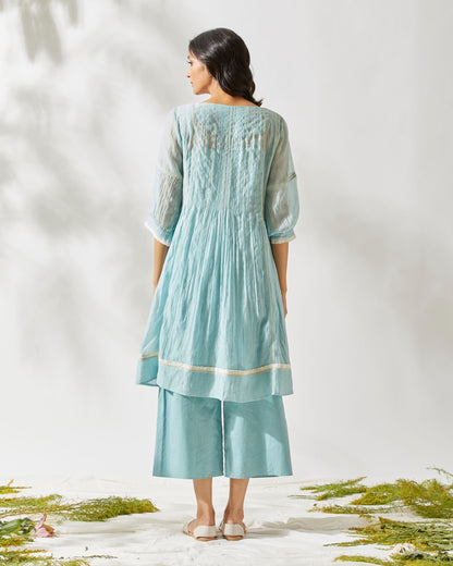 VINTAGE FLIRTY PLEATS TUNIC SET by devyanimehrotra.com with at Kamakhyaa for sustainable fashion