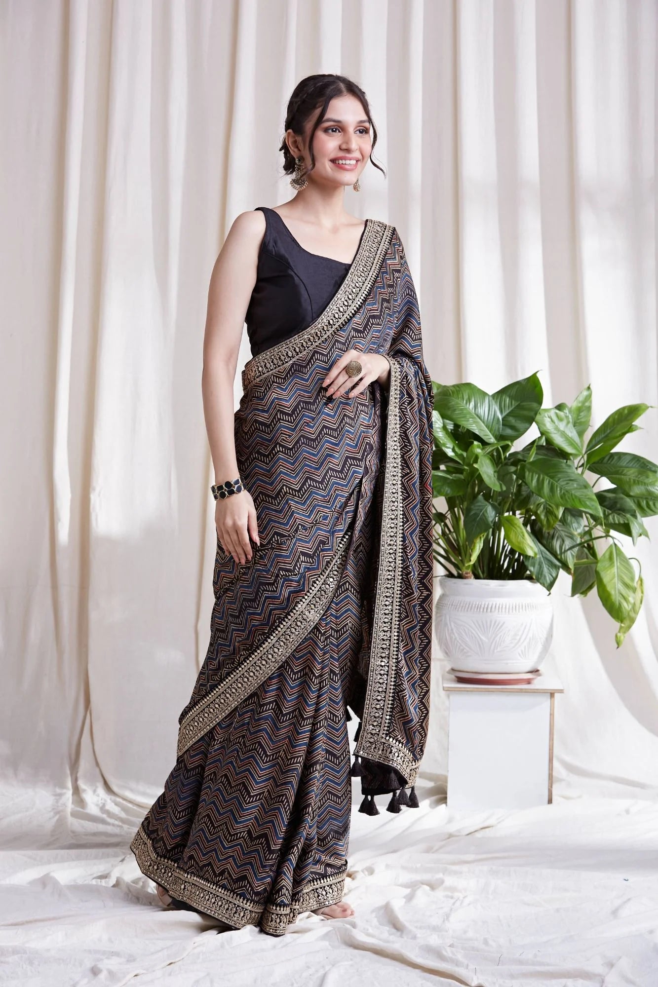 Azha Modal Saree by Hasttvam with ModalFloralFestive WearBlackHandmade by artisans, Natural dyes, Respondible production and Vegan at Kamakhyaa for sustainable fashion