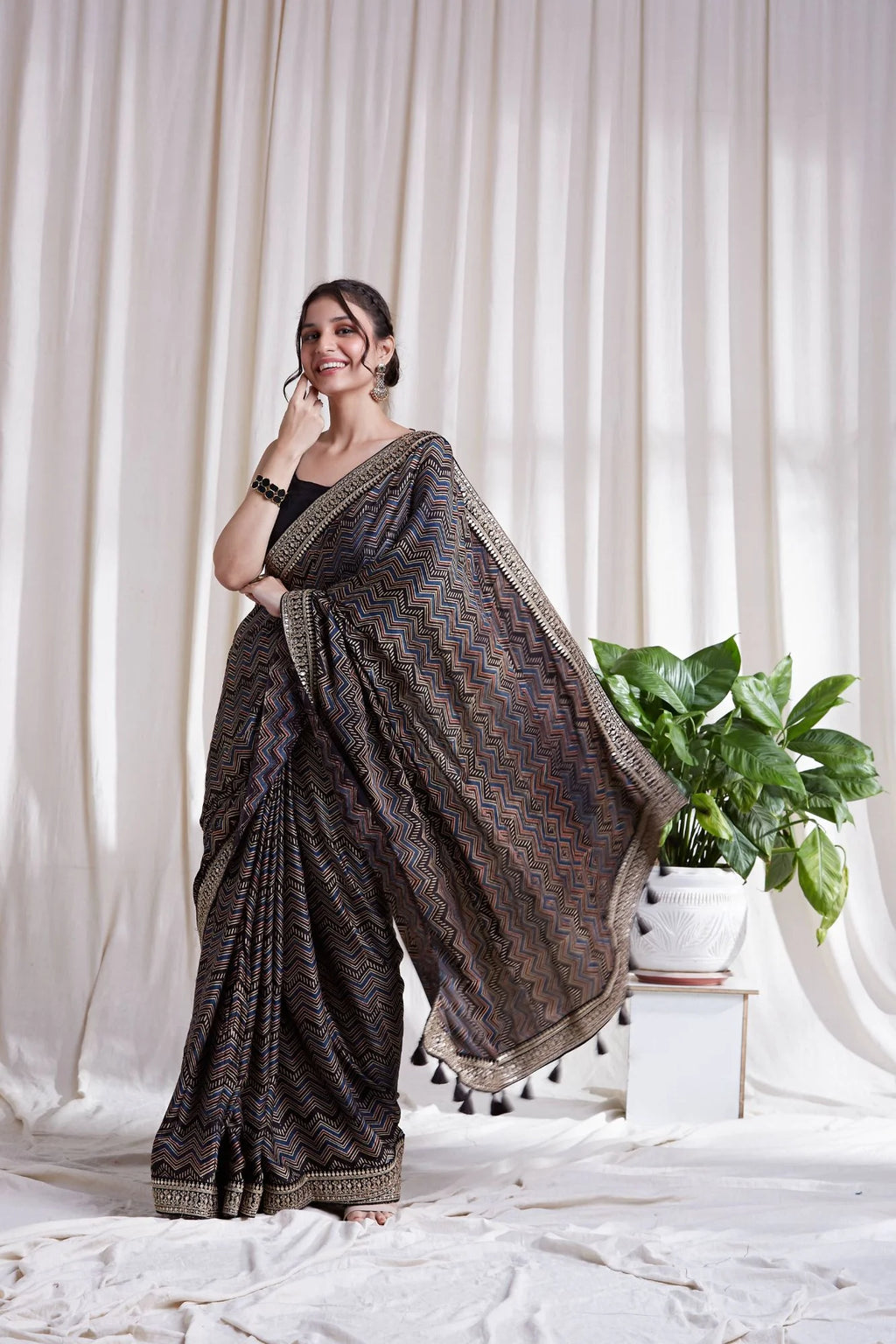 Azha Modal Saree by Hasttvam with ModalFloralFestive WearBlackHandmade by artisans, Natural dyes, Respondible production and Vegan at Kamakhyaa for sustainable fashion