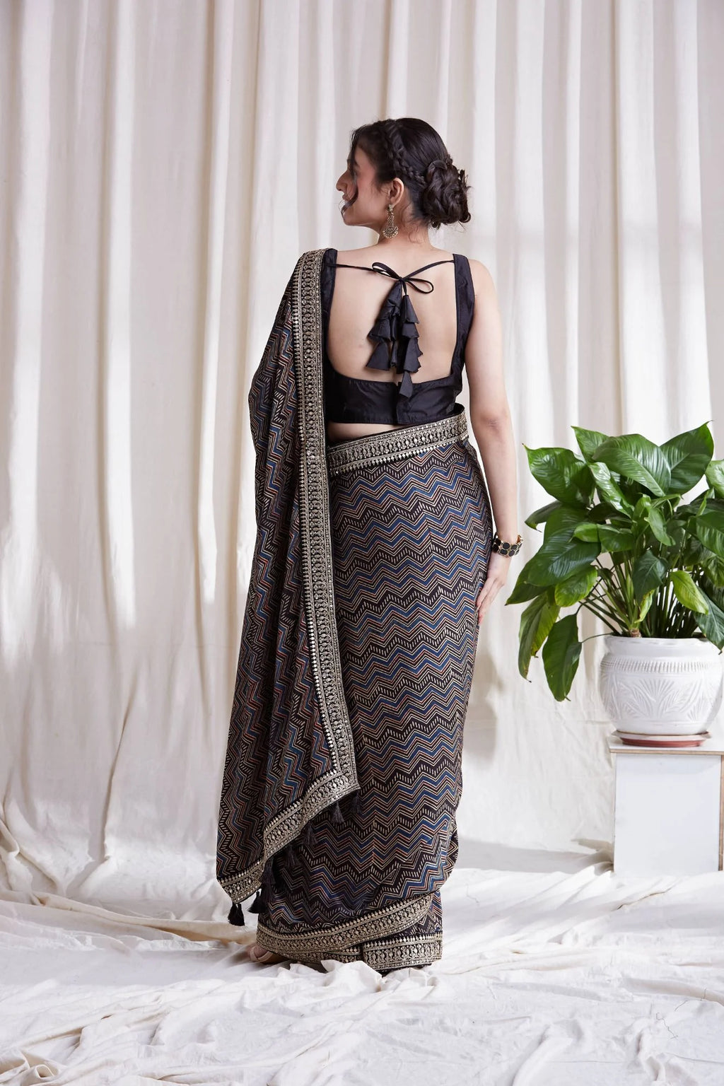 Azha Modal Saree by Hasttvam with ModalFloralFestive WearBlackHandmade by artisans, Natural dyes, Respondible production and Vegan at Kamakhyaa for sustainable fashion