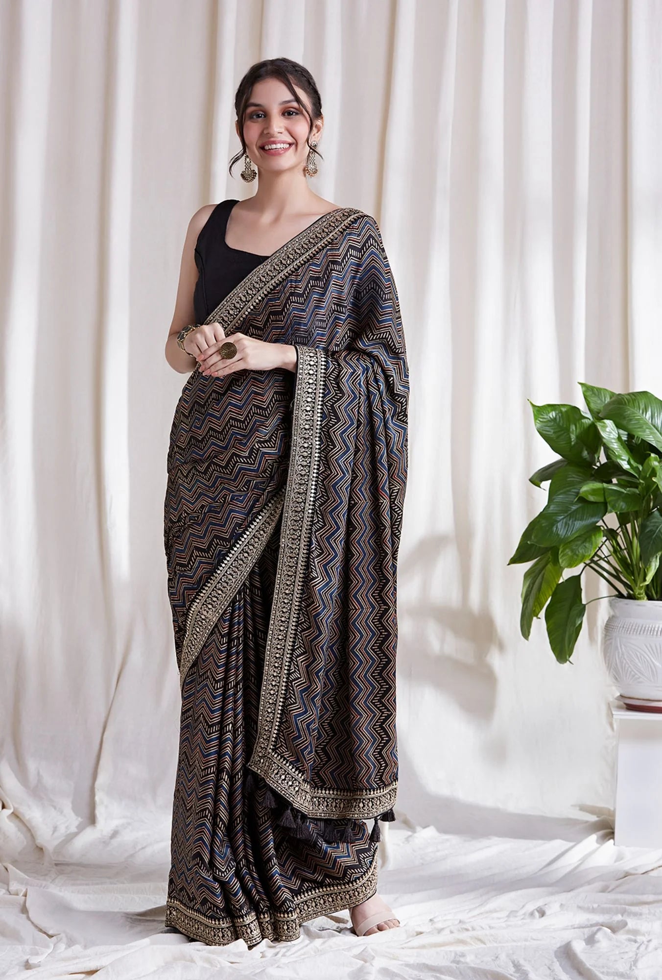 Azha Modal Saree by Hasttvam with ModalFloralFestive WearBlackHandmade by artisans, Natural dyes, Respondible production and Vegan at Kamakhyaa for sustainable fashion