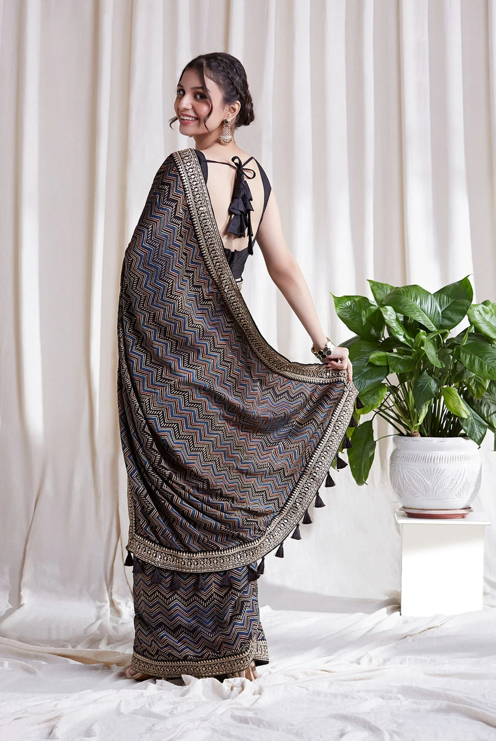 Azha Modal Saree by Hasttvam with ModalFloralFestive WearBlackHandmade by artisans, Natural dyes, Respondible production and Vegan at Kamakhyaa for sustainable fashion