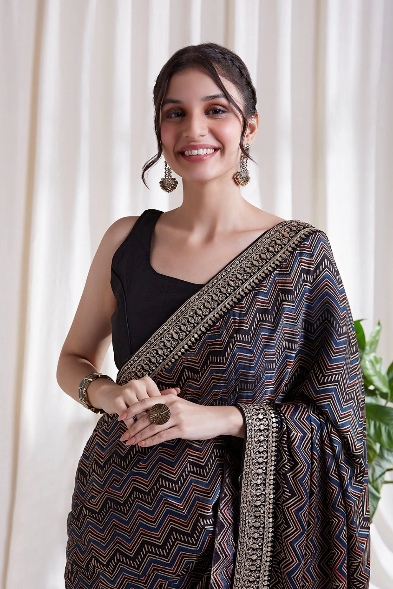 Azha Modal Saree by Hasttvam with ModalFloralFestive WearBlackHandmade by artisans, Natural dyes, Respondible production and Vegan at Kamakhyaa for sustainable fashion