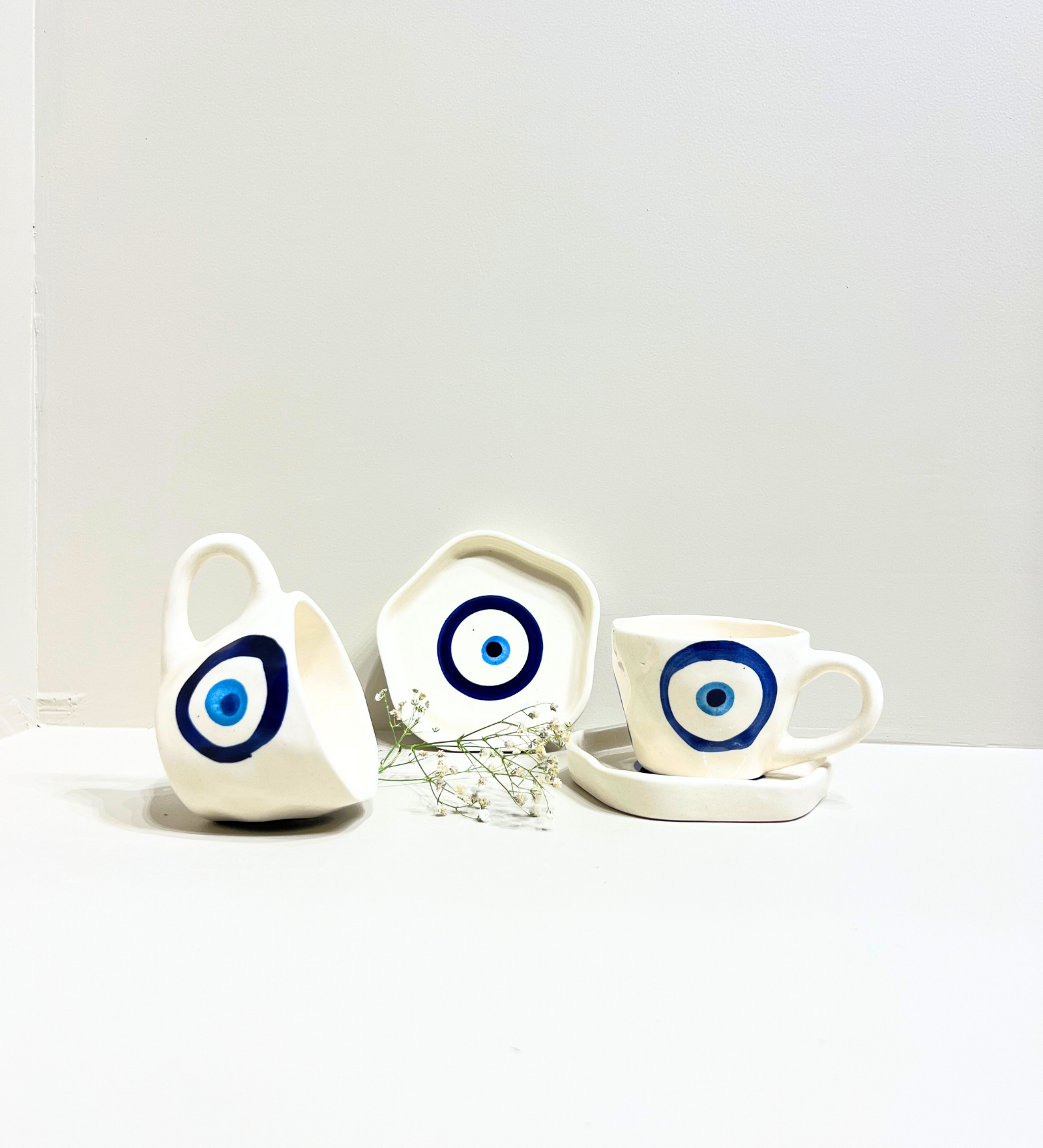 Midnight Nazar – Evil Eye Ceramic Mug & Plate Set by Aetherea World with at Kamakhyaa for sustainable fashion