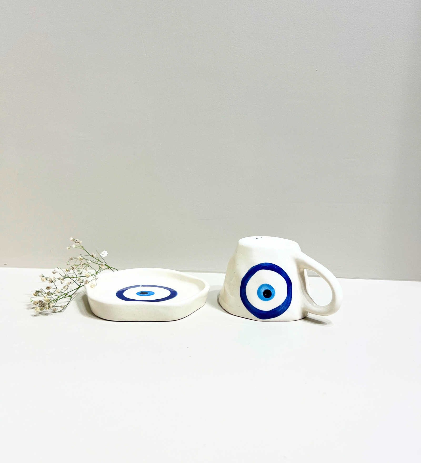 Midnight Nazar – Evil Eye Ceramic Mug & Plate Set by Aetherea World with at Kamakhyaa for sustainable fashion