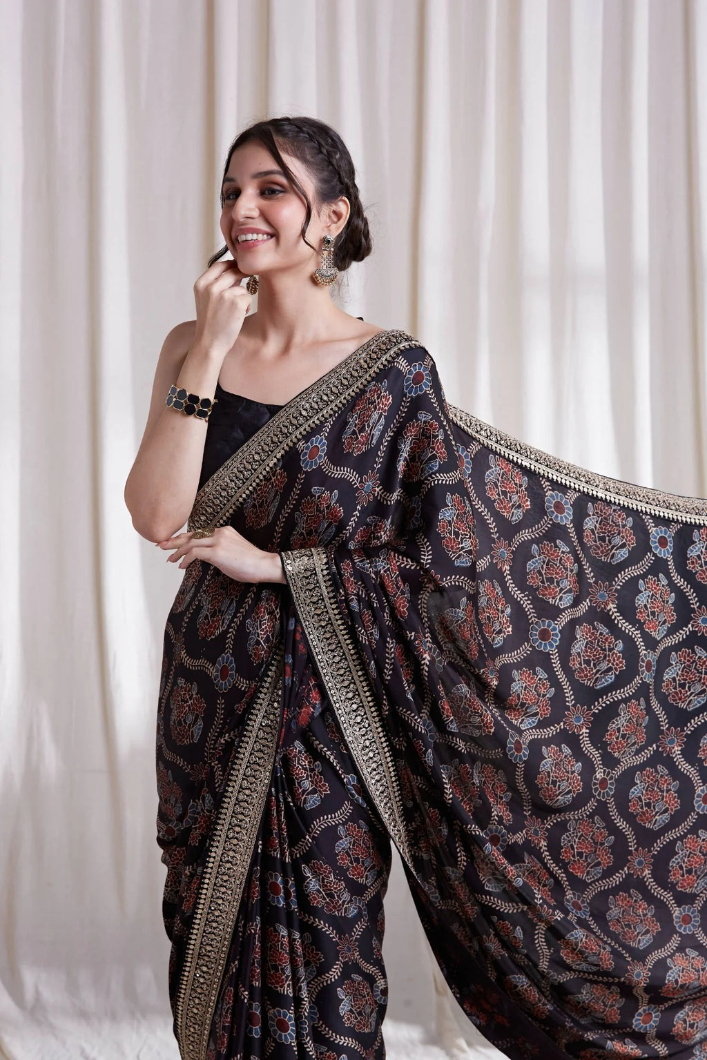 Hasttvam Modal Saree by Hasttvam with ModalFloralFestive WearBlackHandmade by artisans, Natural dyes, Respondible production and Vegan at Kamakhyaa for sustainable fashion