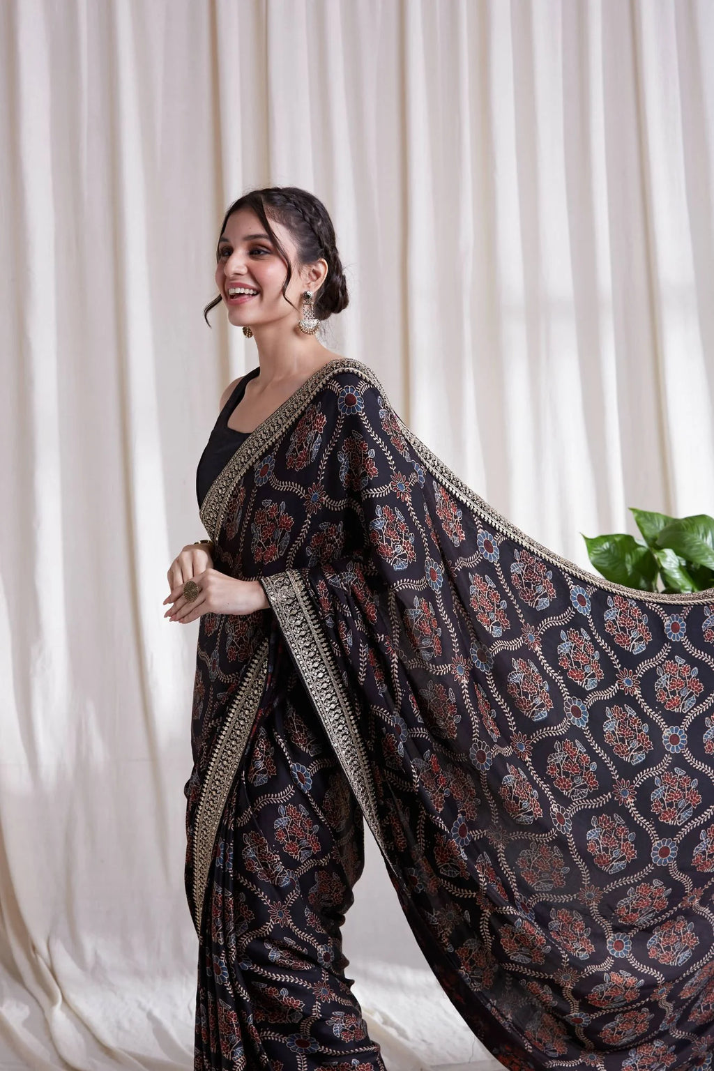 Hasttvam Modal Saree by Hasttvam with ModalFloralFestive WearBlackHandmade by artisans, Natural dyes, Respondible production and Vegan at Kamakhyaa for sustainable fashion