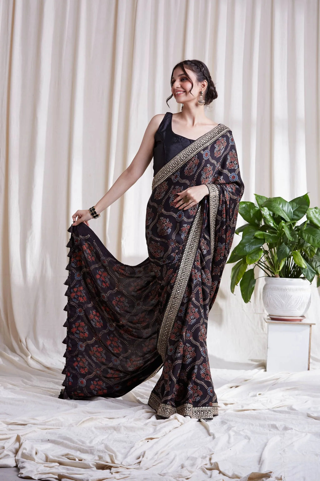 Hasttvam Modal Saree by Hasttvam with ModalFloralFestive WearBlackHandmade by artisans, Natural dyes, Respondible production and Vegan at Kamakhyaa for sustainable fashion