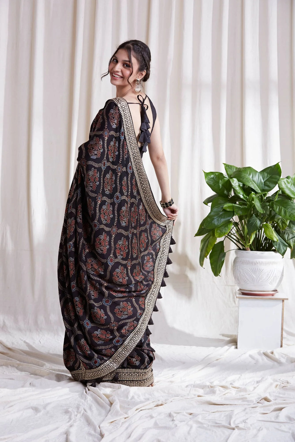 Hasttvam Modal Saree by Hasttvam with ModalFloralFestive WearBlackHandmade by artisans, Natural dyes, Respondible production and Vegan at Kamakhyaa for sustainable fashion
