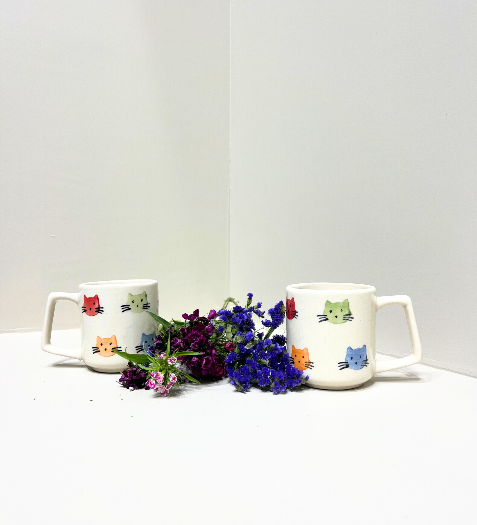 Purrfect Companions – Hand-Painted Kitty Face Mug by Aetherea World with at Kamakhyaa for sustainable fashion