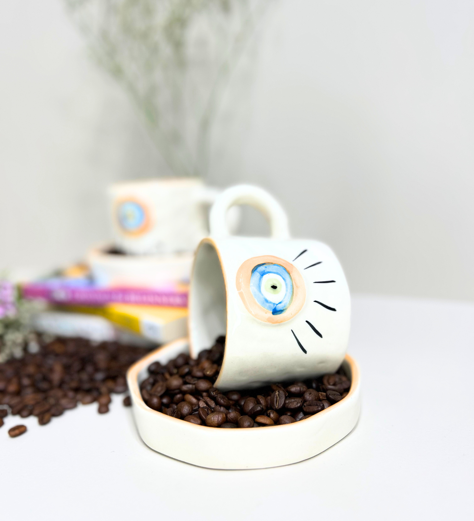 Sunstone Gaze – Evil Eye Ceramic Mug & Plate Set by Aetherea World with at Kamakhyaa for sustainable fashion