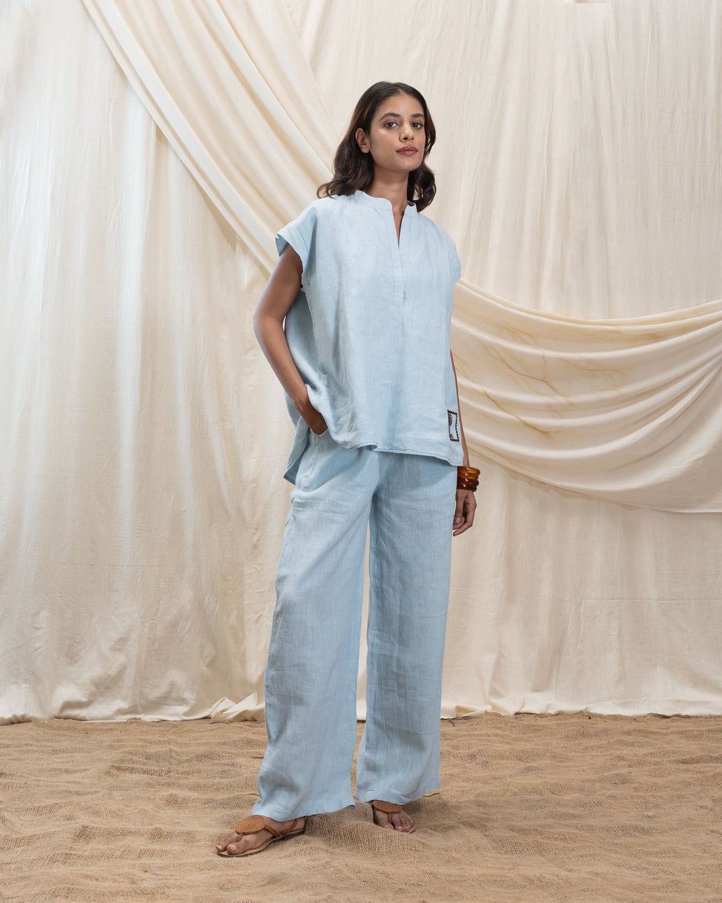 Linen v neck top and pleated drawsing pant set by Akashi Clothing with The Stamp Edit By Akashi Clothing at Kamakhyaa for sustainable fashion