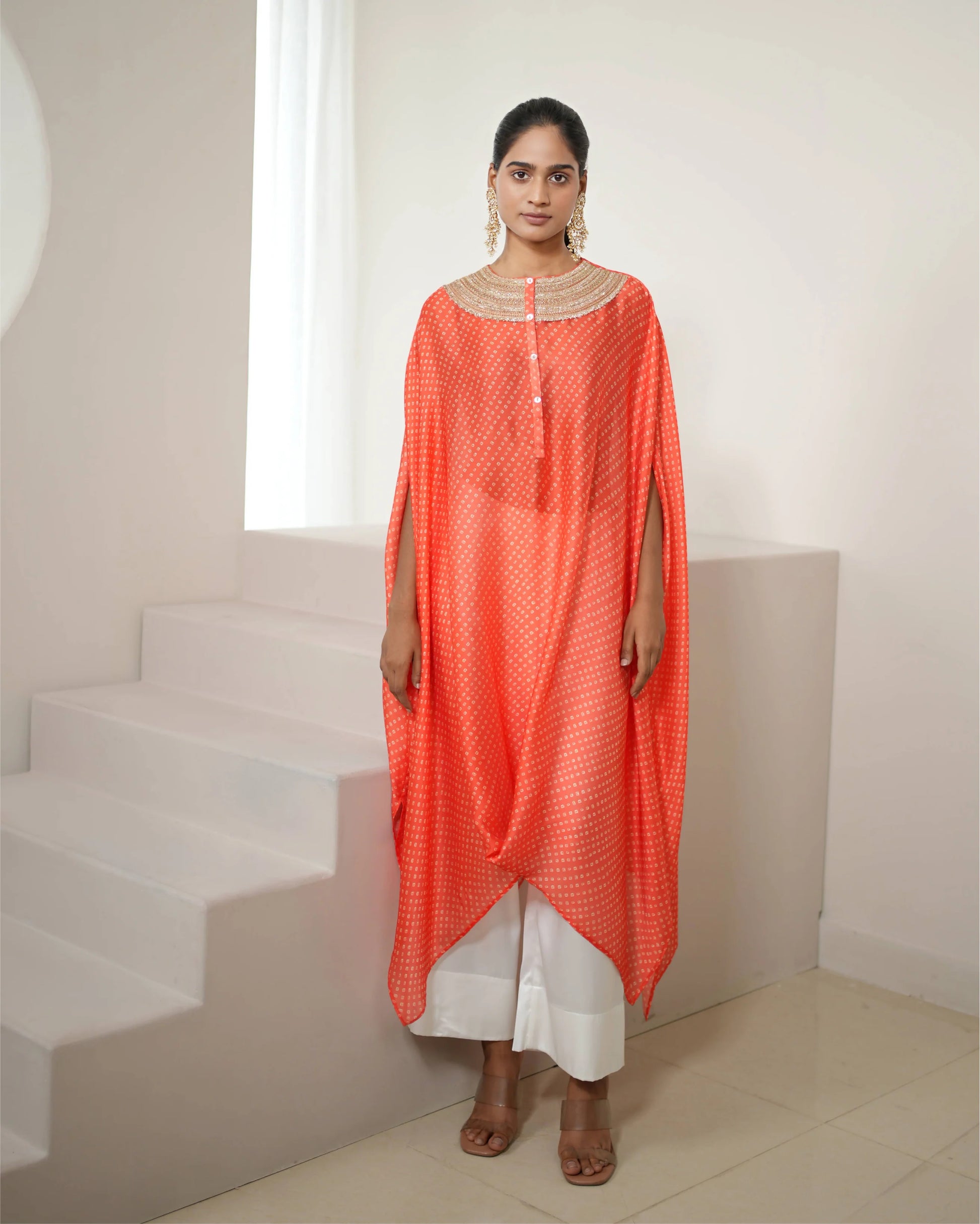 Orange Cowl Neck Bandhej Print Kurta Pant Set by Mayura Kumar with Bandhej, Bandhej Bandhini Mixology by Mayura Kumar, Dry clean, Festive Wear, Orange, Relaxed Fit, Satin Silk, Tie-Dye at Kamakhyaa for sustainable fashion