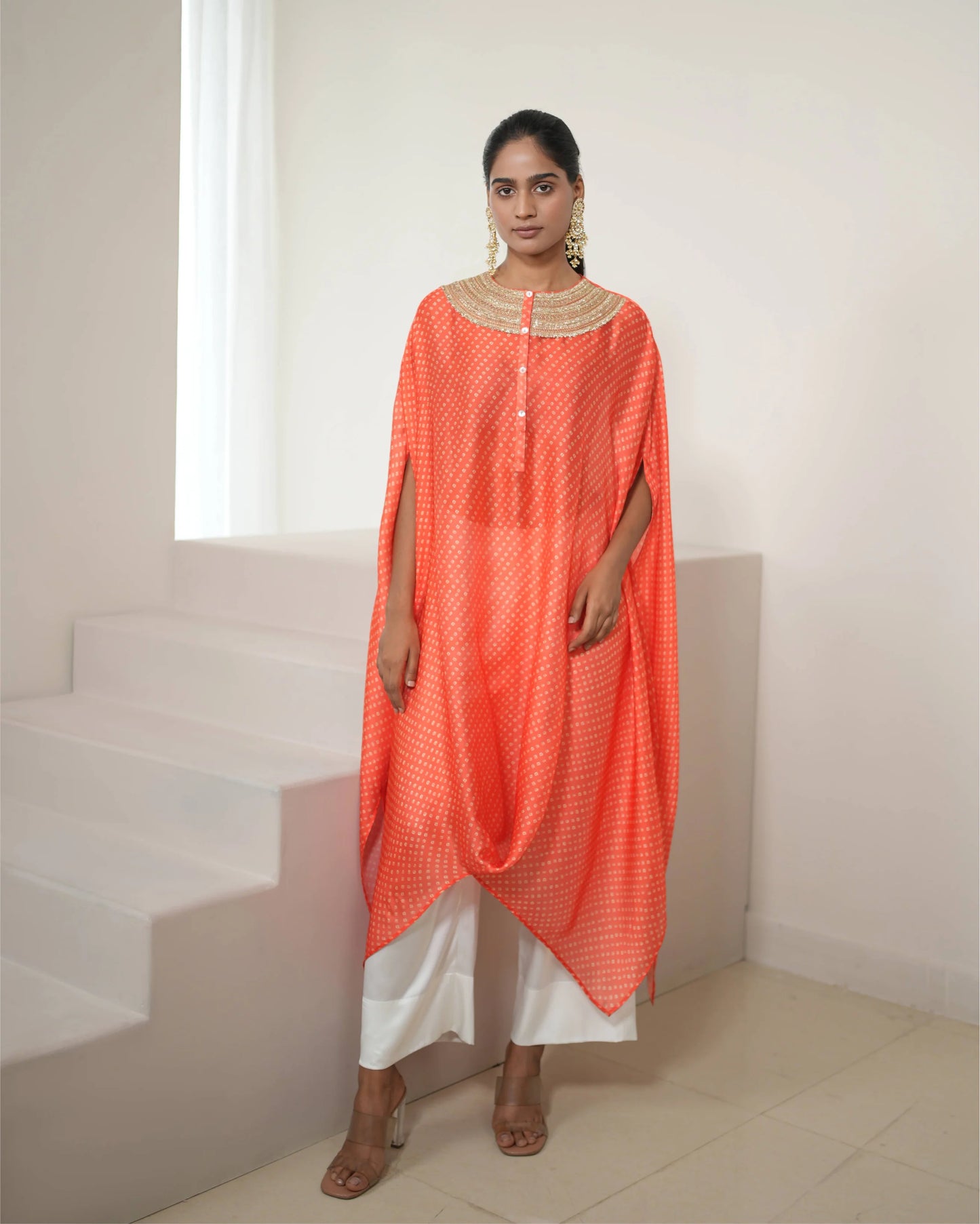 Orange Cowl Neck Bandhej Print Kurta Pant Set by Mayura Kumar with Bandhej, Bandhej Bandhini Mixology by Mayura Kumar, Dry clean, Festive Wear, Orange, Relaxed Fit, Satin Silk, Tie-Dye at Kamakhyaa for sustainable fashion