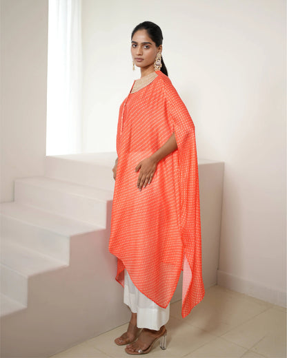 Orange Cowl Neck Bandhej Print Kurta Pant Set by Mayura Kumar with Bandhej, Bandhej Bandhini Mixology by Mayura Kumar, Dry clean, Festive Wear, Orange, Relaxed Fit, Satin Silk, Tie-Dye at Kamakhyaa for sustainable fashion