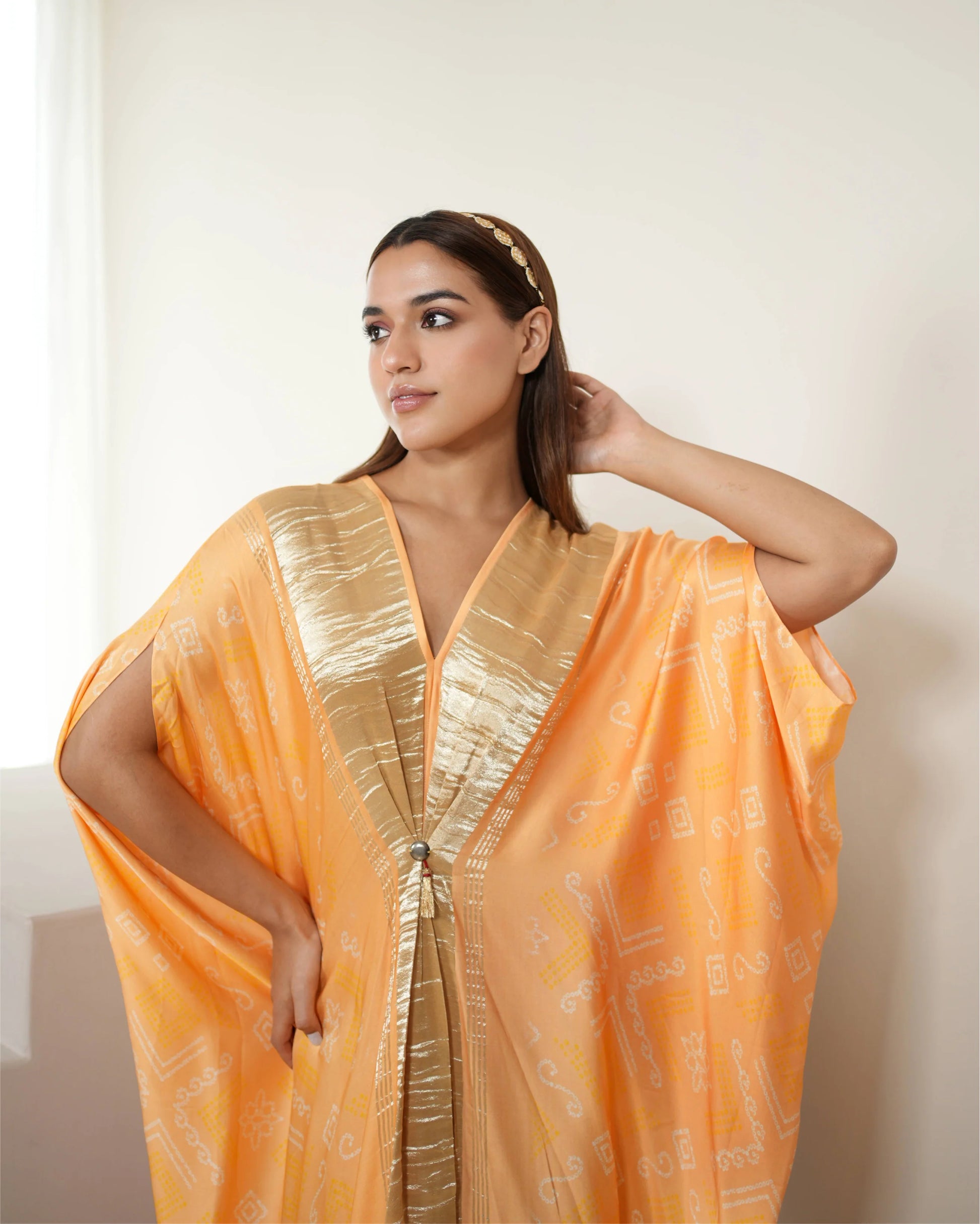 Peach Zari Weave Free Size Kaftan by Mayura Kumar with Bandhej, Bandhej Bandhini Mixology by Mayura Kumar, Dry clean, Festive Wear, Modal, Modal Satin Silk, Pink, Relaxed Fit, Satin Silk, Silk, Tie-Dye at Kamakhyaa for sustainable fashion