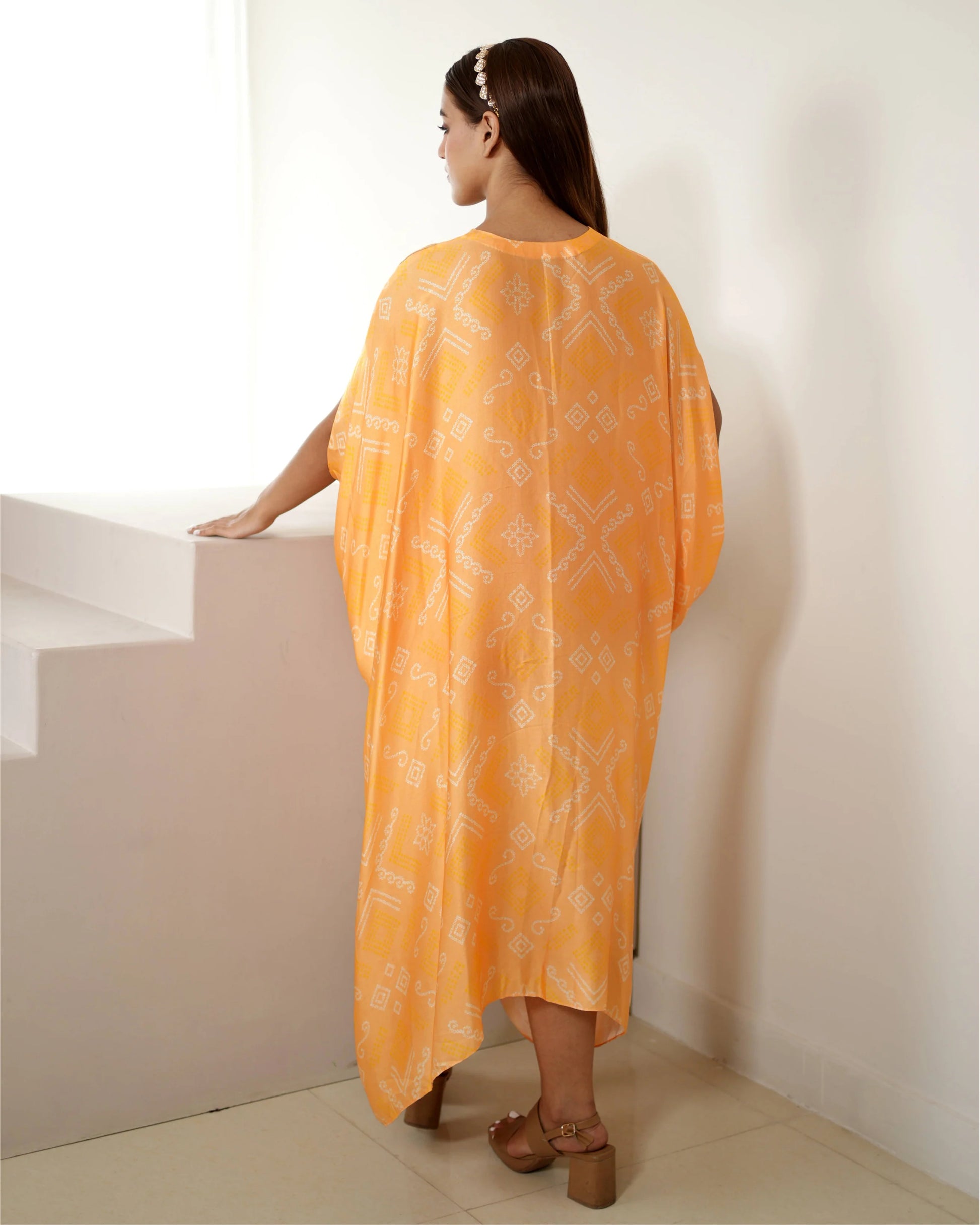 Peach Zari Weave Free Size Kaftan by Mayura Kumar with Bandhej, Bandhej Bandhini Mixology by Mayura Kumar, Dry clean, Festive Wear, Modal, Modal Satin Silk, Pink, Relaxed Fit, Satin Silk, Silk, Tie-Dye at Kamakhyaa for sustainable fashion