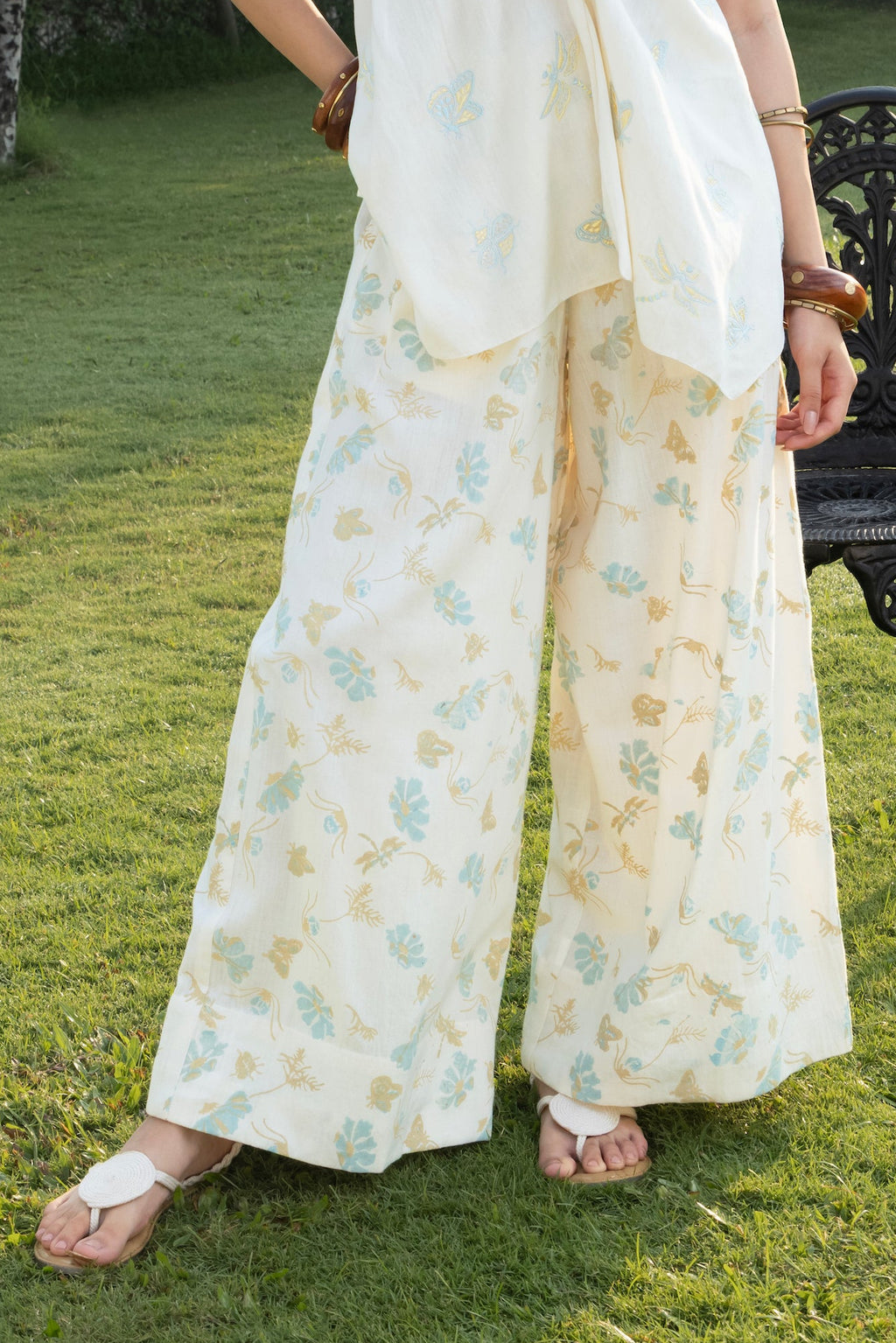Printed Wide-Leg Pants with Side Elastic Waist by Akashi Clothing with Cosmos by Akashi Clothing, Internal Tags Missing at Kamakhyaa India for sustainable fashion