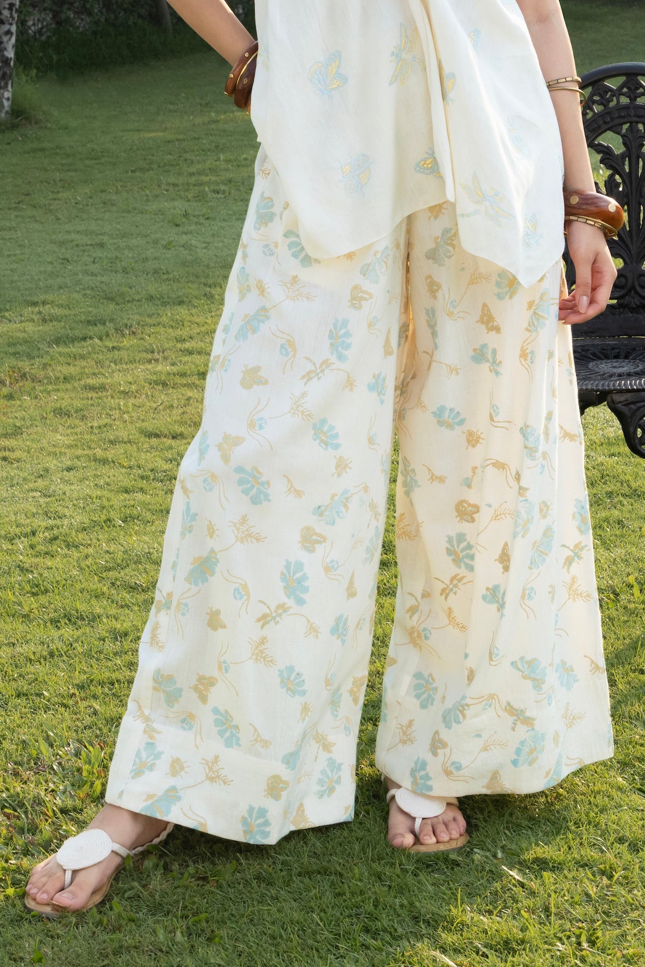Printed Wide-Leg Pants with Side Elastic Waist by Akashi Clothing with Cosmos by Akashi Clothing, Internal Tags Missing at Kamakhyaa India for sustainable fashion