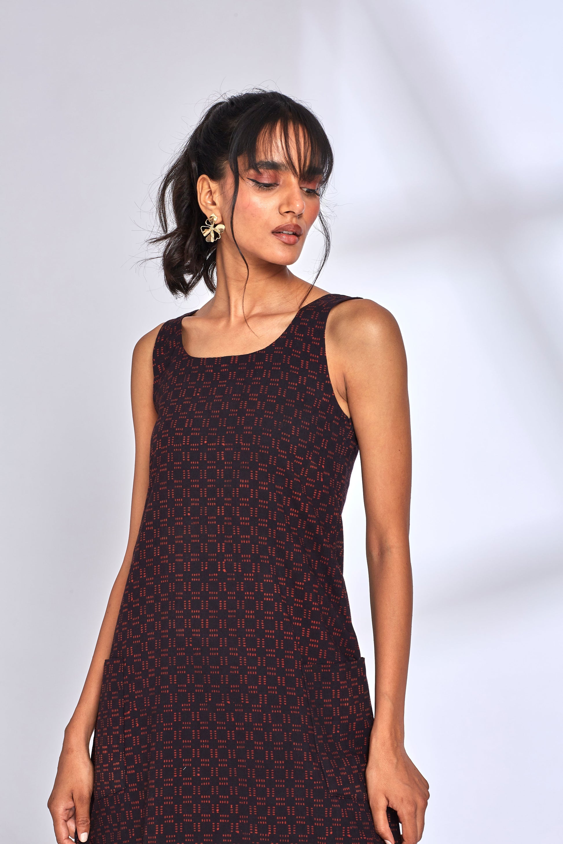 Black Midi Dress with side slit by Hasttvam with Black, Cotton, Eden by Hasttvam, Fusion Wear, Natural Dye, Printed, Relaxed Fit, Responsible production and Vegan, Sleeveless Dresses, Solids at Kamakhyaa for sustainable fashion