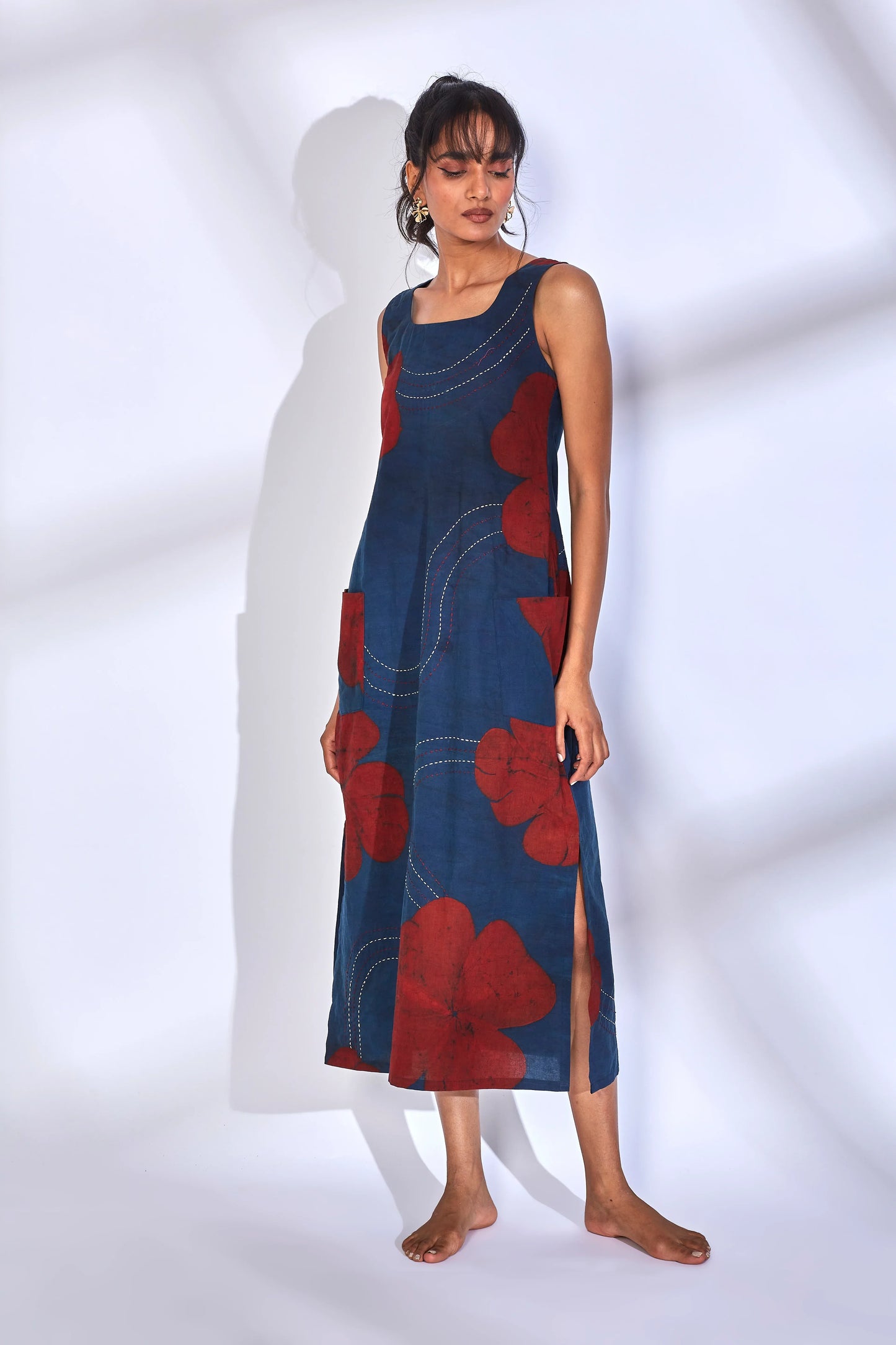 Blue Printed Midi Dress with side slit by Hasttvam with Blue, Brunch Wear, Cotton, Eden by Hasttvam, Floral, Fusion Wear, Independence Day USA, Indigo, Natural Dye, Relaxed Fit, Responsible production and Vegan, Sleeveless Dresses at Kamakhyaa for sustainable fashion