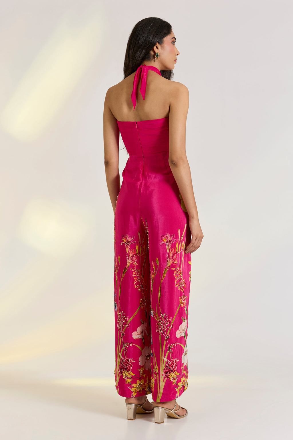 Crepe Pink Floral Draped Jumpsuit by Ewoke with Crepe, destination wedding outfits, festive, Hot Pink, jumpsuit, Nostalgia's Thread by Ewoke, printed jumpsuit, sustainable fashion, wedding dress, Wedding wear at Kamakhyaa for sustainable fashion
