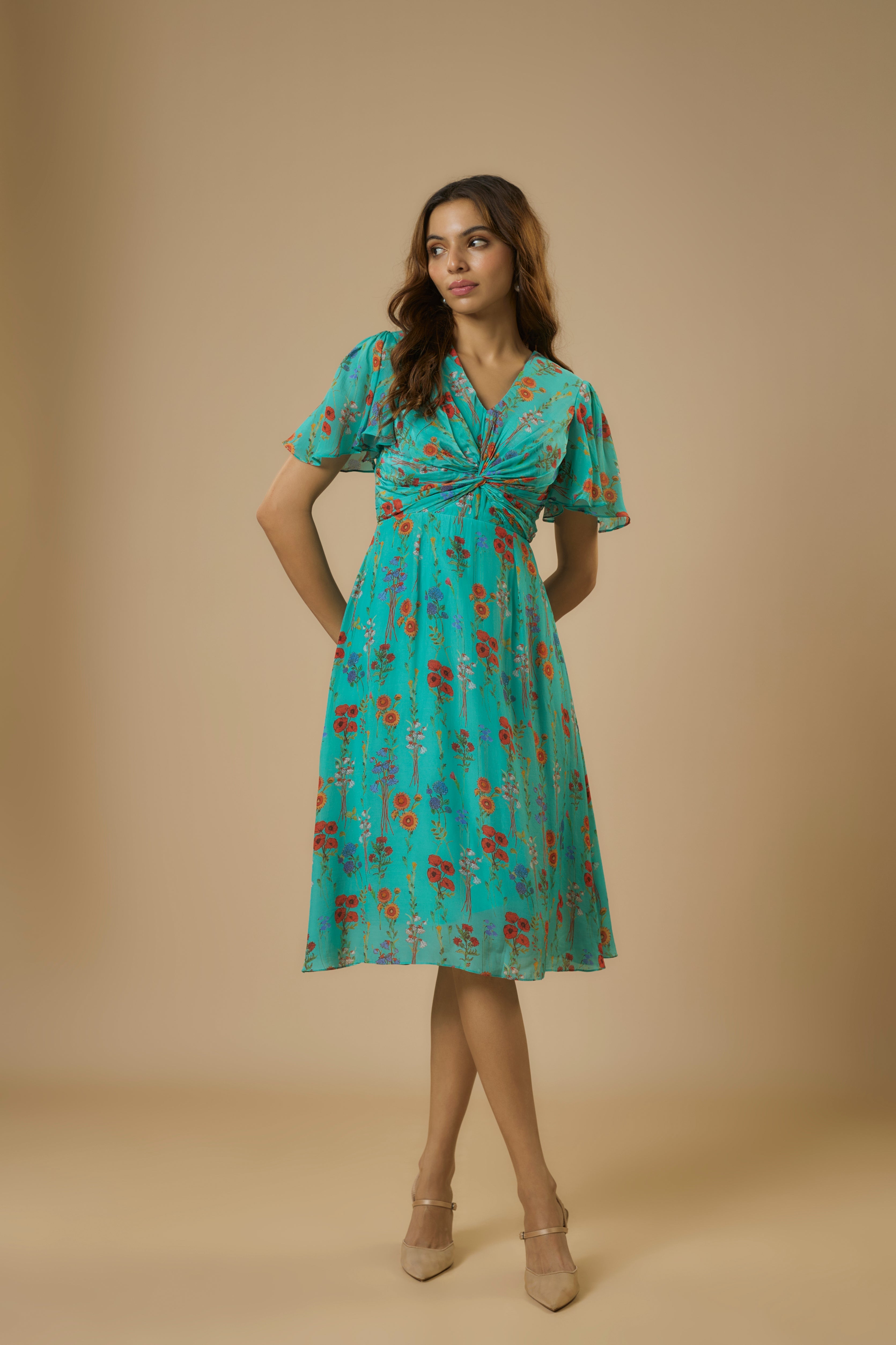Crepe Blue Knot Dress by Ewoke with blue dress, Blue Printed Dress, Crepe, fit and flare, knot dress, Nostalgia's Thread by Ewoke, printed dress at Kamakhyaa for sustainable fashion