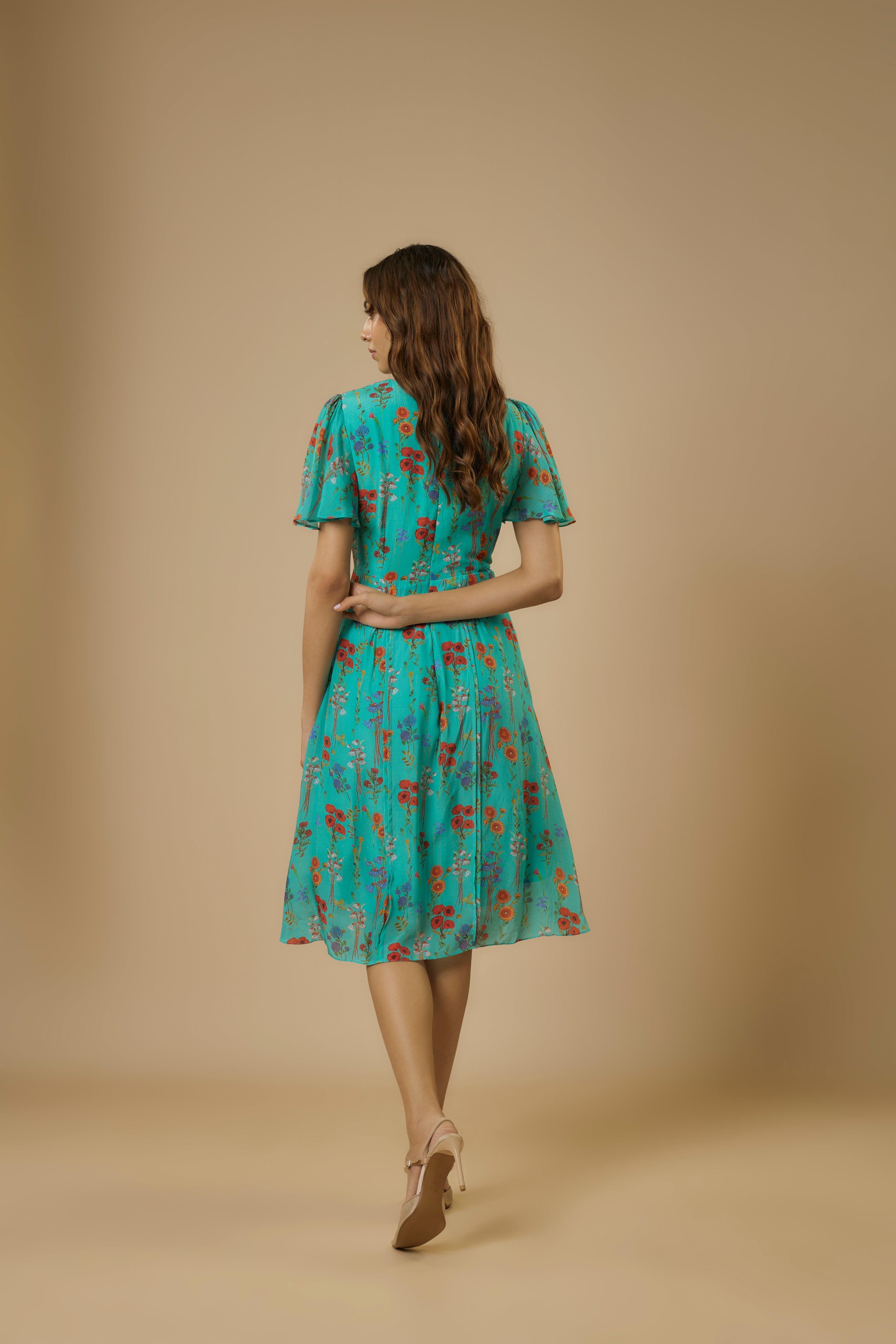Crepe Blue Knot Dress by Ewoke with blue dress, Blue Printed Dress, Crepe, fit and flare, knot dress, Nostalgia's Thread by Ewoke, printed dress at Kamakhyaa for sustainable fashion