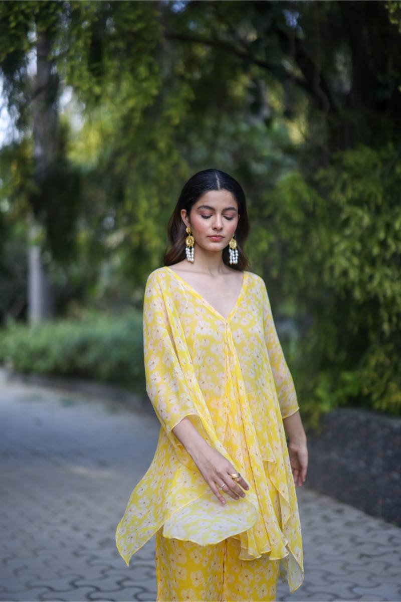 Chiffon Petal Haze Co-ord Set by Ewoke with Chiffon, Nostalgia's Thread by Ewoke, yellow coord set, yellow set, yellow top and trouser at Kamakhyaa for sustainable fashion