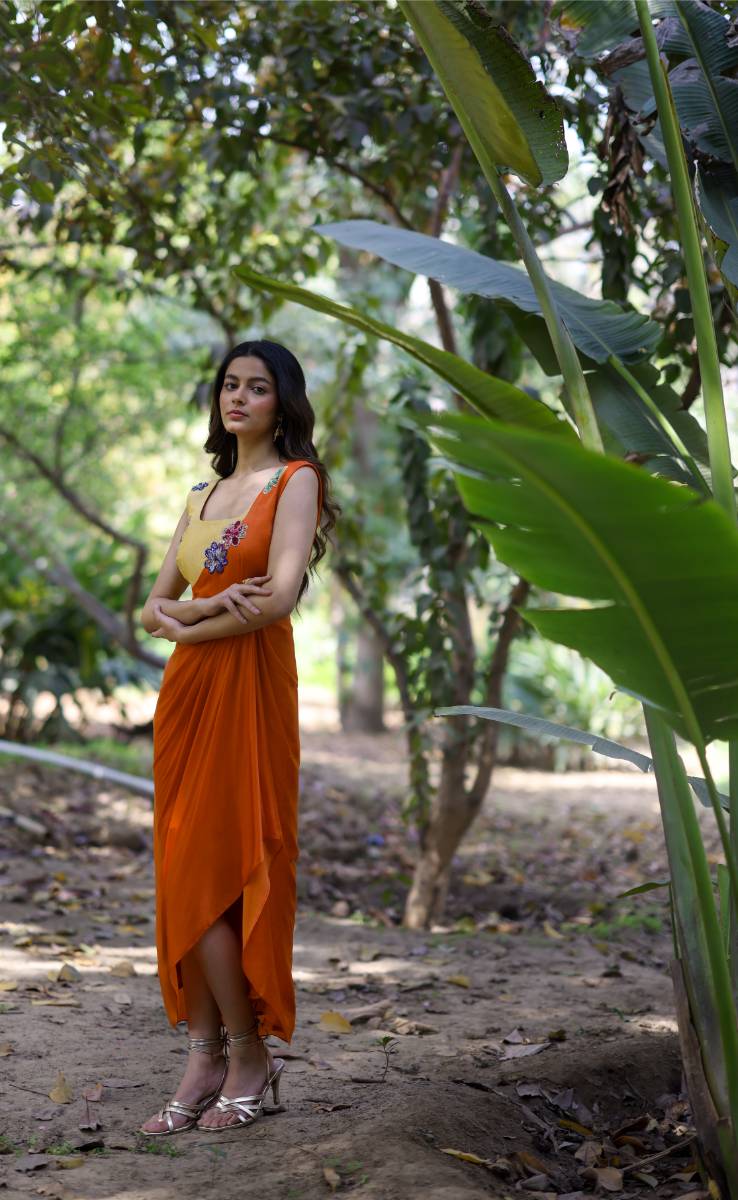 Georgette Orange & Yellow Draped Dress by Ewoke with ewoke dresses, Floral, Georgette, Nostalgia's Thread by Ewoke, Orange, Wedding wear, womenswear dresses at Kamakhyaa for sustainable fashion