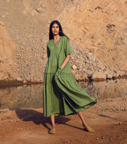 Green Tiered Midi Dress with pockets by Khara Kapas with 32 Days Of Summer by Khara Kapas, Cotton Khadi, Green, Midi Dresses, Natural, Relaxed Fit, Resort Wear, Solids, Tiered Dresses, Womenswear at Kamakhyaa for sustainable fashion