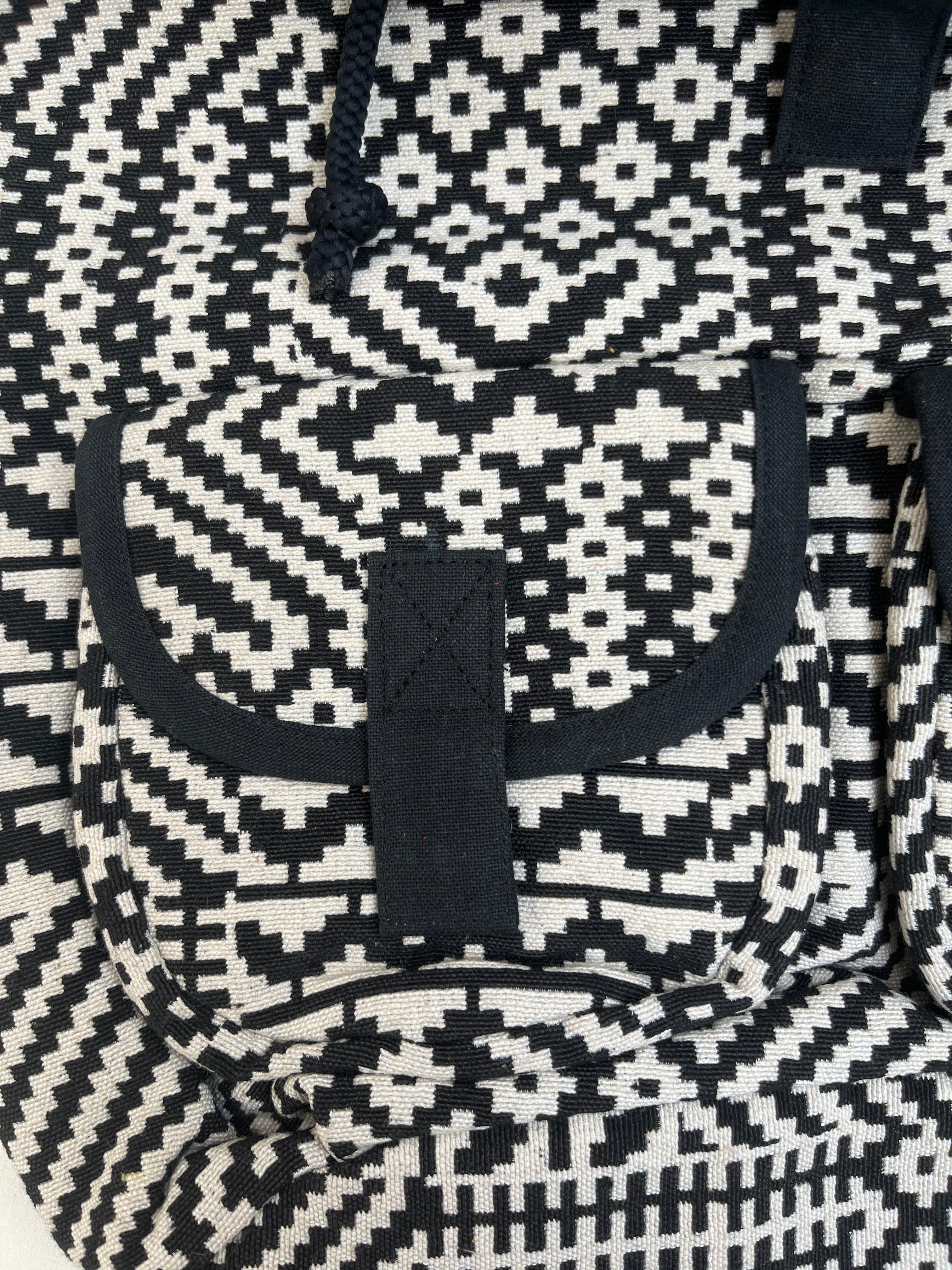 Black and White Drawstring Bag by Discarded Fresh Bags with at Kamakhyaa for sustainable fashion