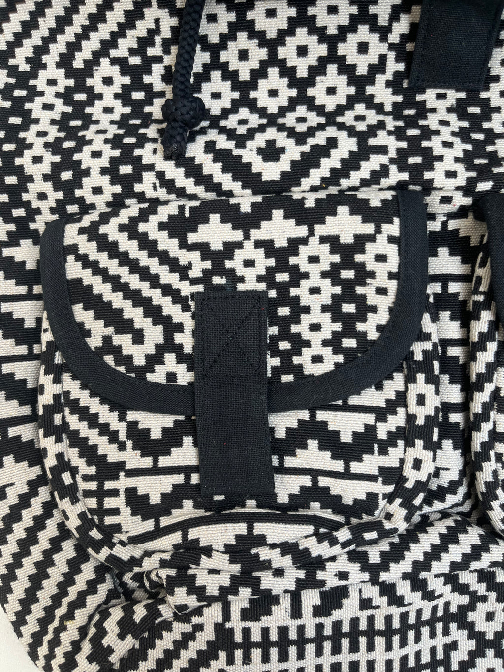 Black and White Drawstring Bag by Discarded Fresh Bags with at Kamakhyaa for sustainable fashion