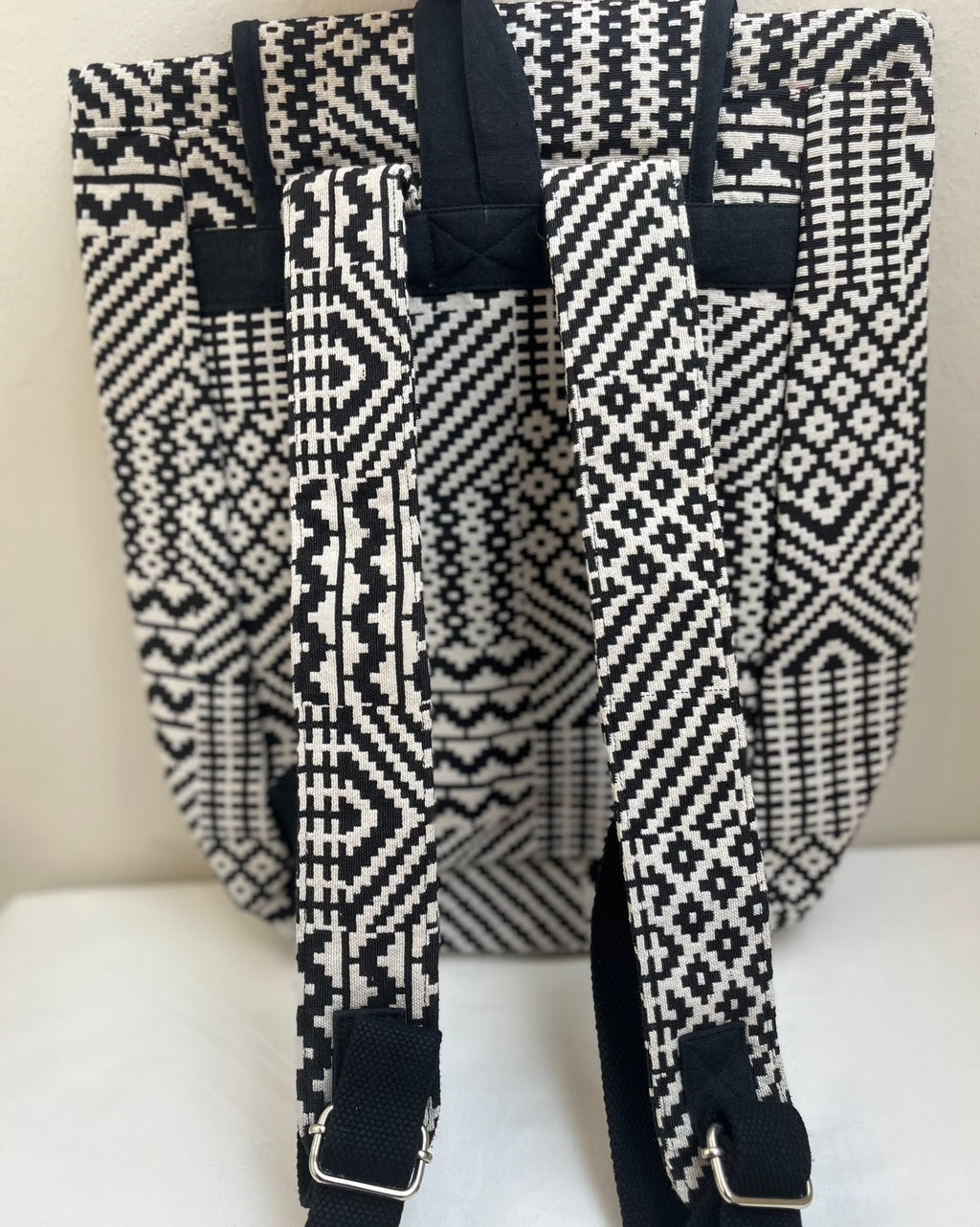 Black and White Drawstring Bag by Discarded Fresh Bags with at Kamakhyaa for sustainable fashion