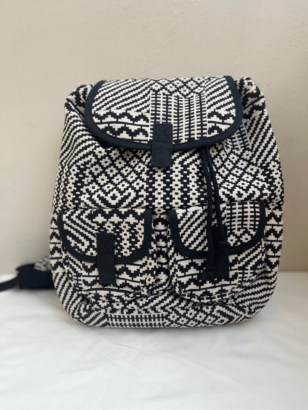 Black and White Drawstring Bag by Discarded Fresh Bags with at Kamakhyaa for sustainable fashion