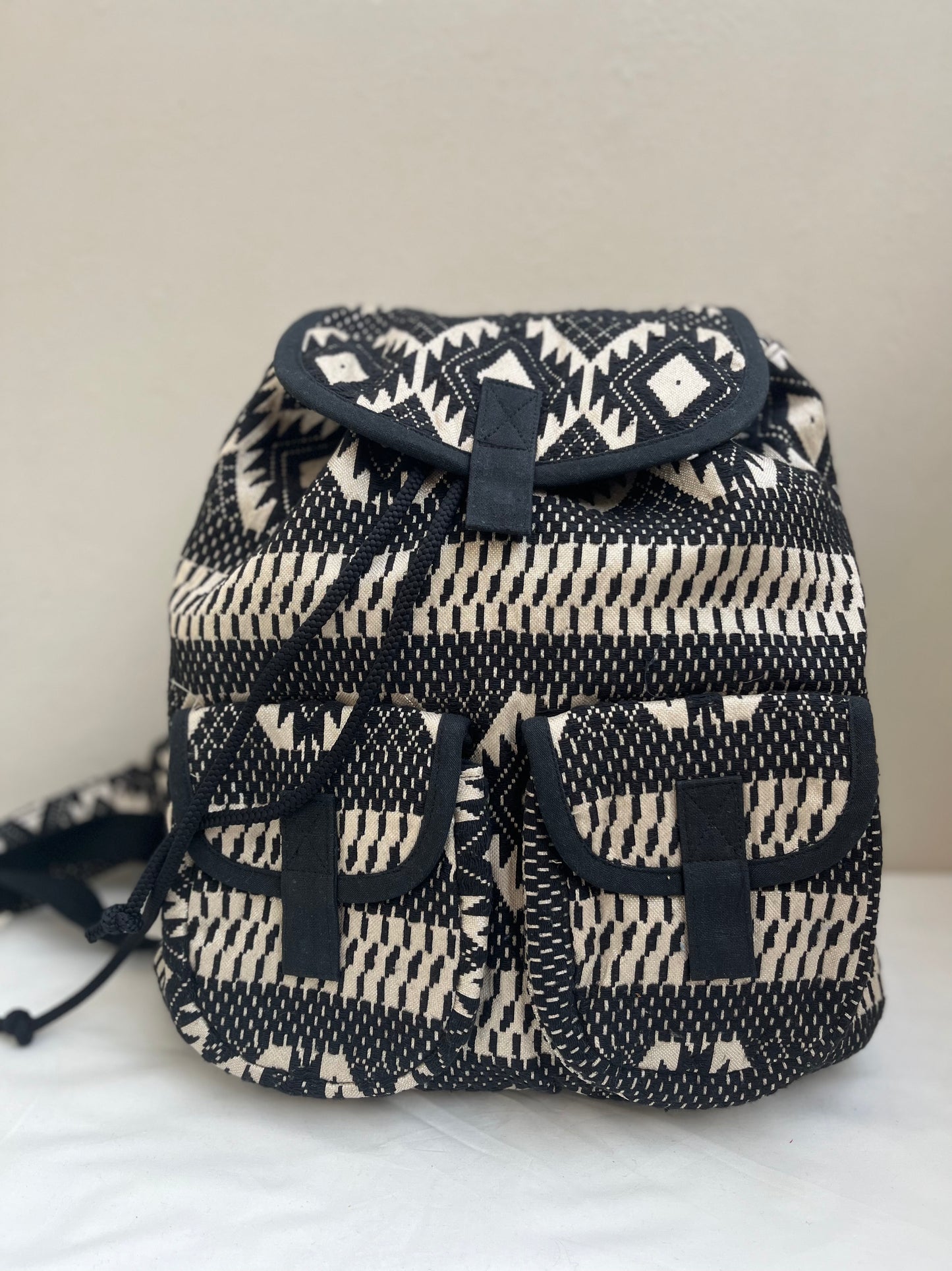 Black and White Drawstring Bag by Discarded Fresh Bags with at Kamakhyaa for sustainable fashion