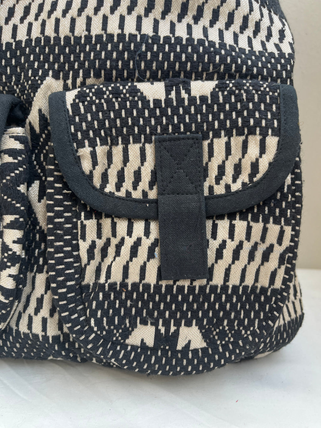 Black and White Drawstring Bag by Discarded Fresh Bags with at Kamakhyaa for sustainable fashion