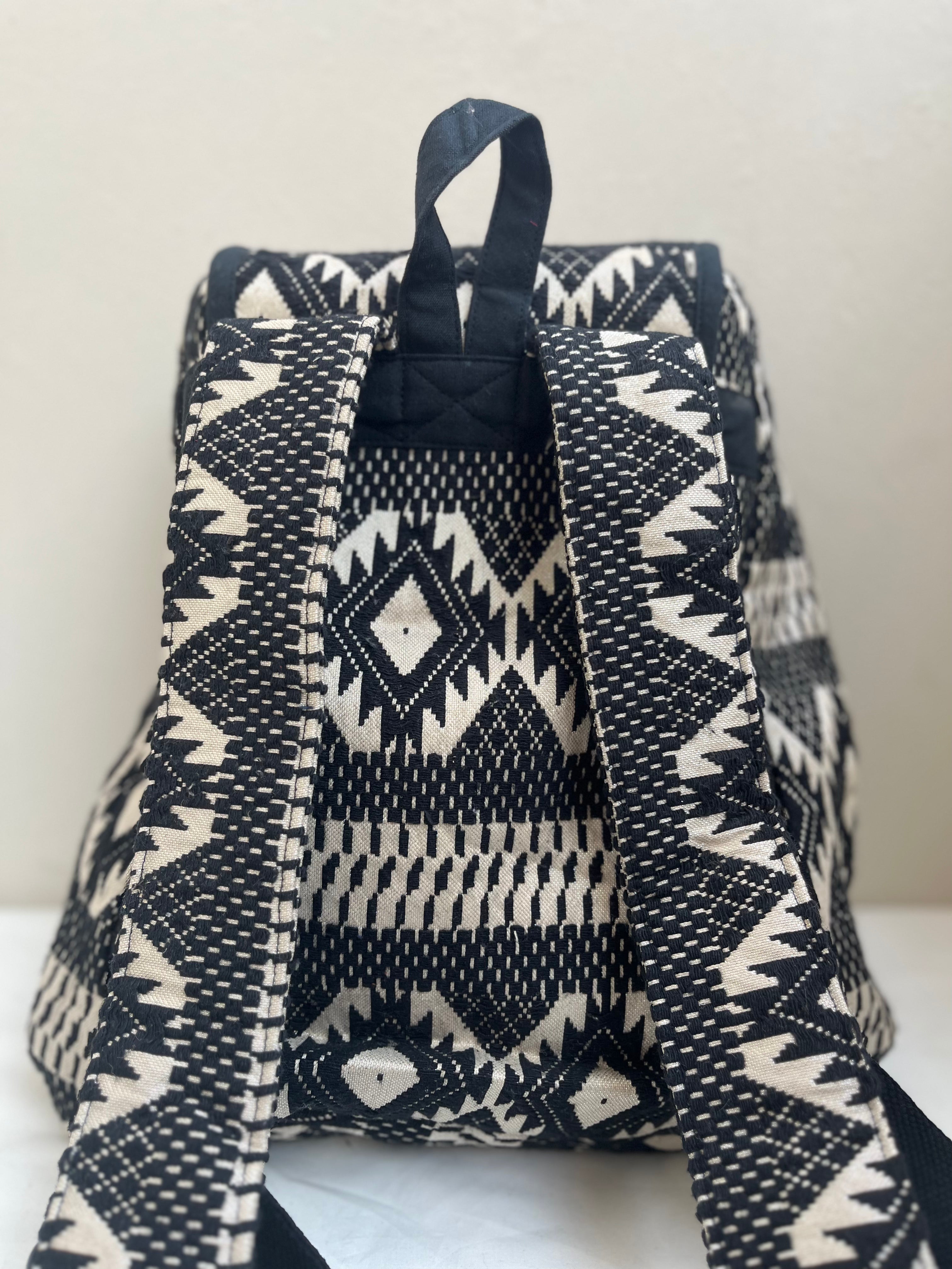 Black and White Drawstring Bag by Discarded Fresh Bags with at Kamakhyaa for sustainable fashion