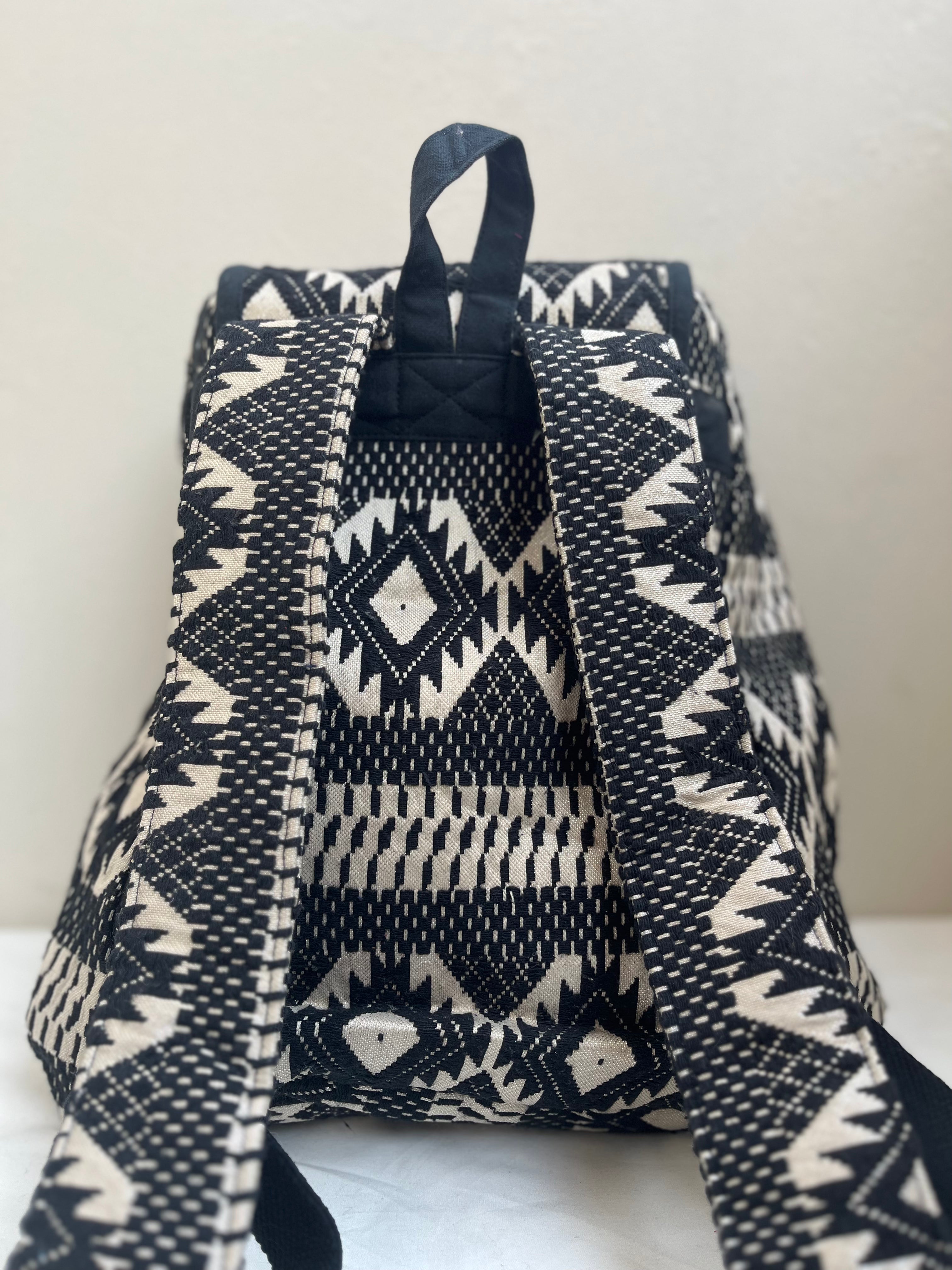 Black and White Drawstring Bag by Discarded Fresh Bags with at Kamakhyaa for sustainable fashion