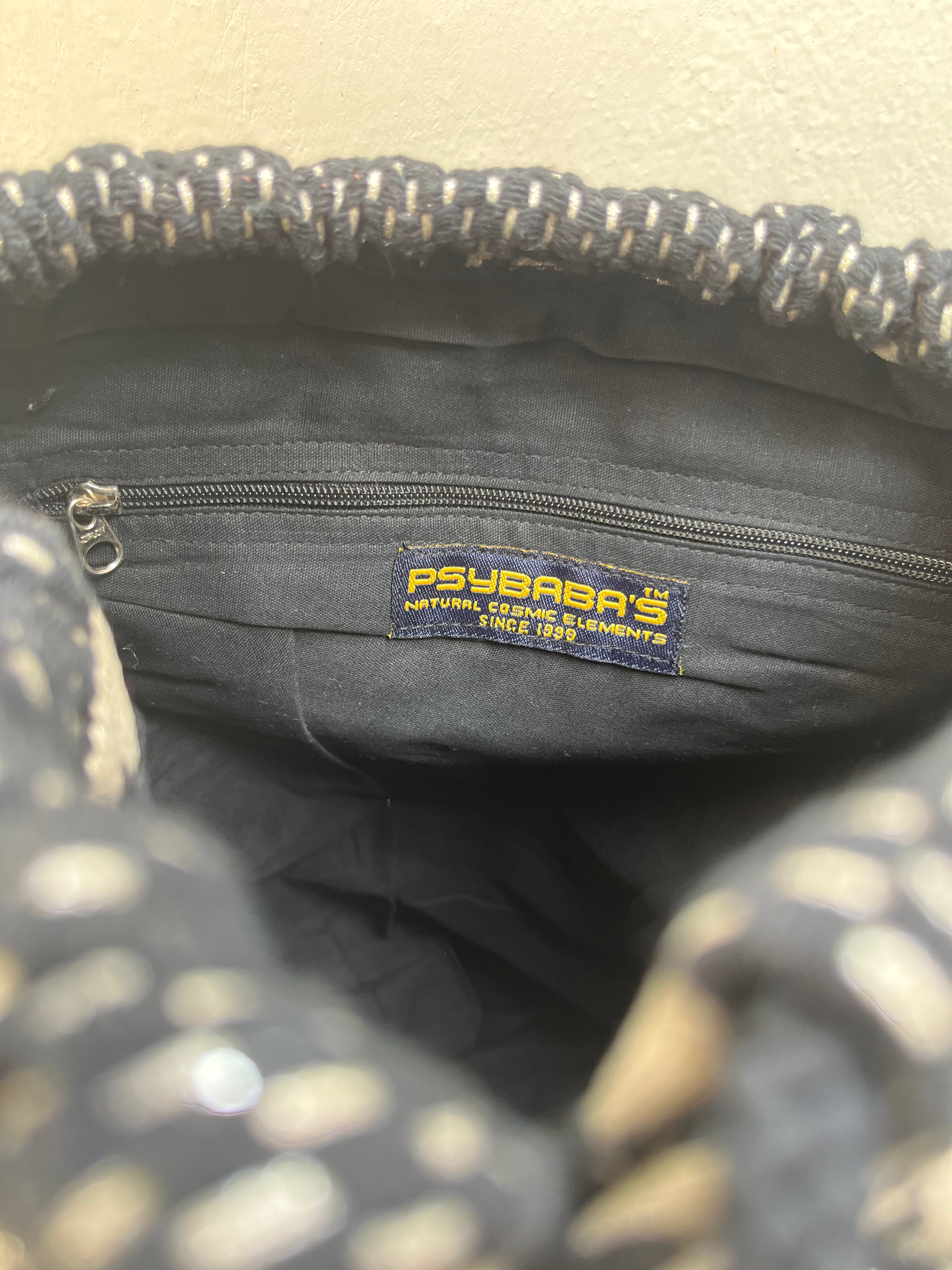 Black and White Drawstring Bag by Discarded Fresh Bags with at Kamakhyaa for sustainable fashion