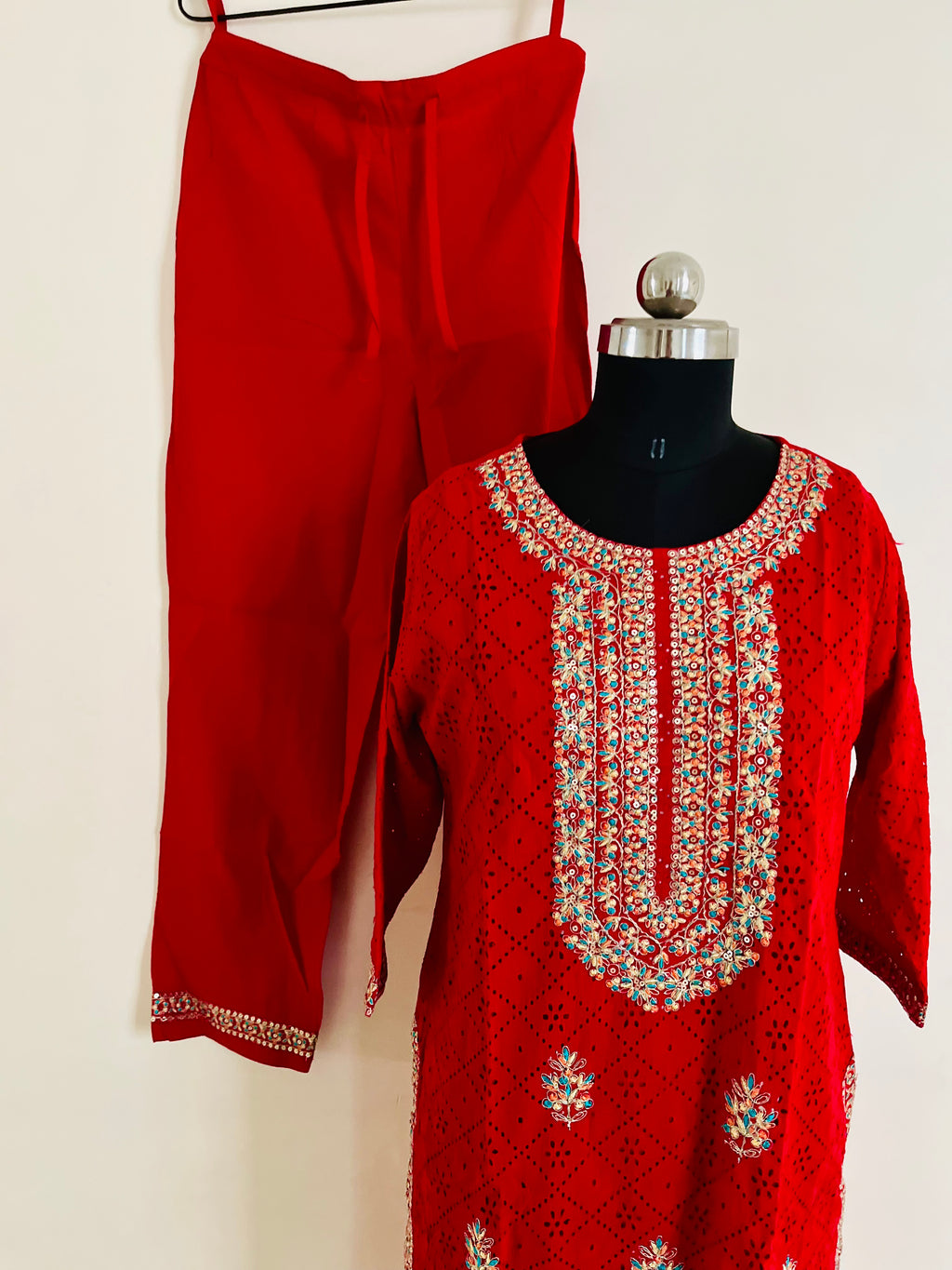 Red Cotton Cutwork Kurta Set With Dupatta by Indian Wear with Cotton, Cutwork, Ethnic Wear, Kurta Pant Sets, Kurta Set with Dupattas, Natural, Red, Regular Fit, Womenswear at Kamakhyaa for sustainable fashion