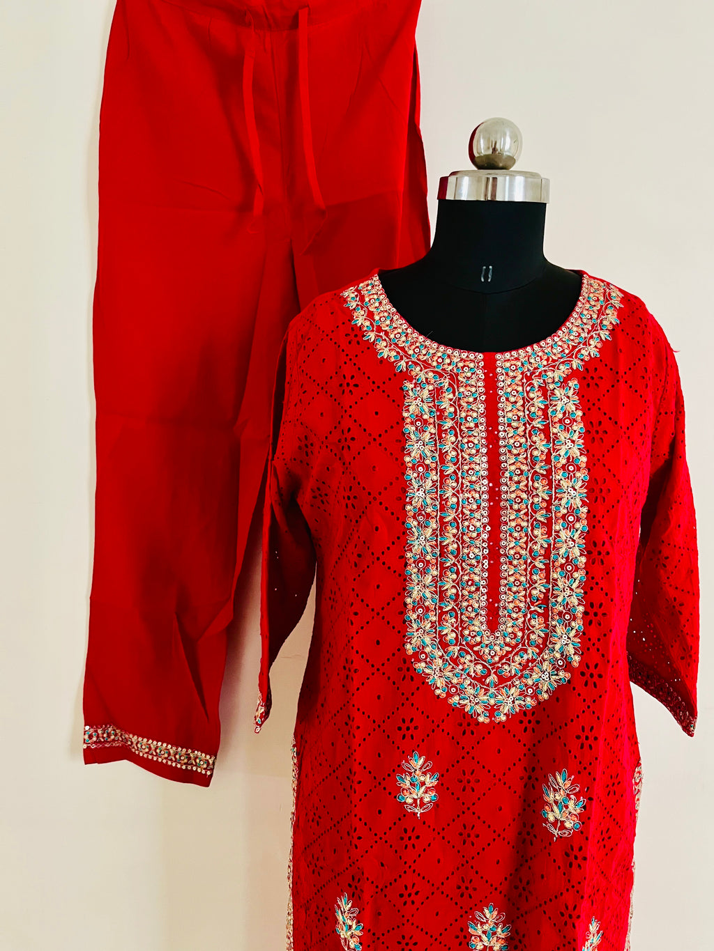 Red Cotton Cutwork Kurta Set With Dupatta by Indian Wear with Cotton, Cutwork, Ethnic Wear, Kurta Pant Sets, Kurta Set with Dupattas, Natural, Red, Regular Fit, Womenswear at Kamakhyaa for sustainable fashion