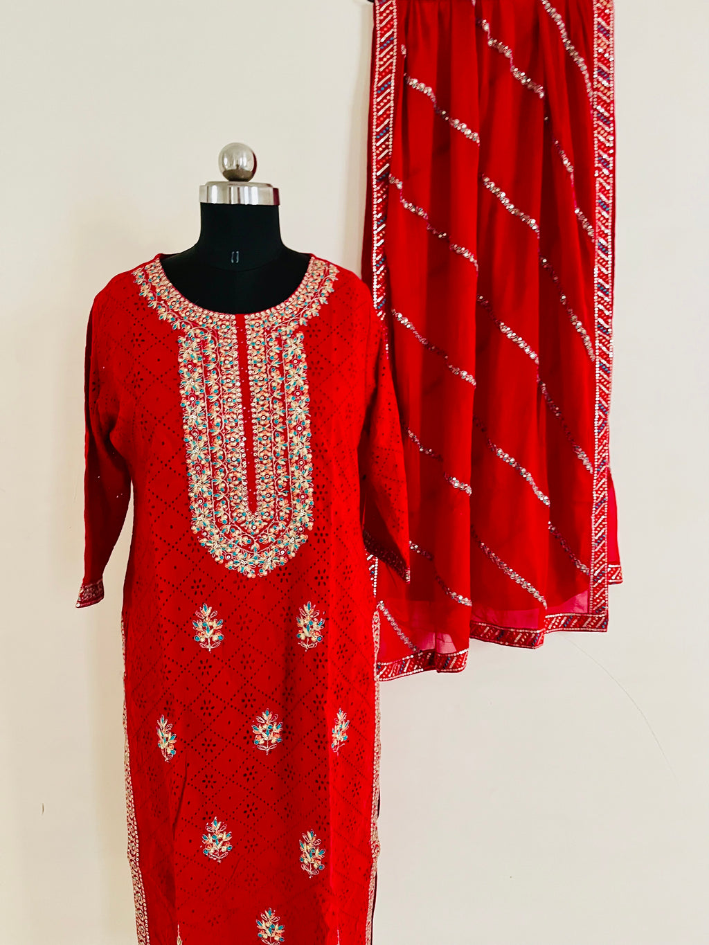 Red Cotton Cutwork Kurta Set With Dupatta by Indian Wear with Cotton, Cutwork, Ethnic Wear, Kurta Pant Sets, Kurta Set with Dupattas, Natural, Red, Regular Fit, Womenswear at Kamakhyaa for sustainable fashion