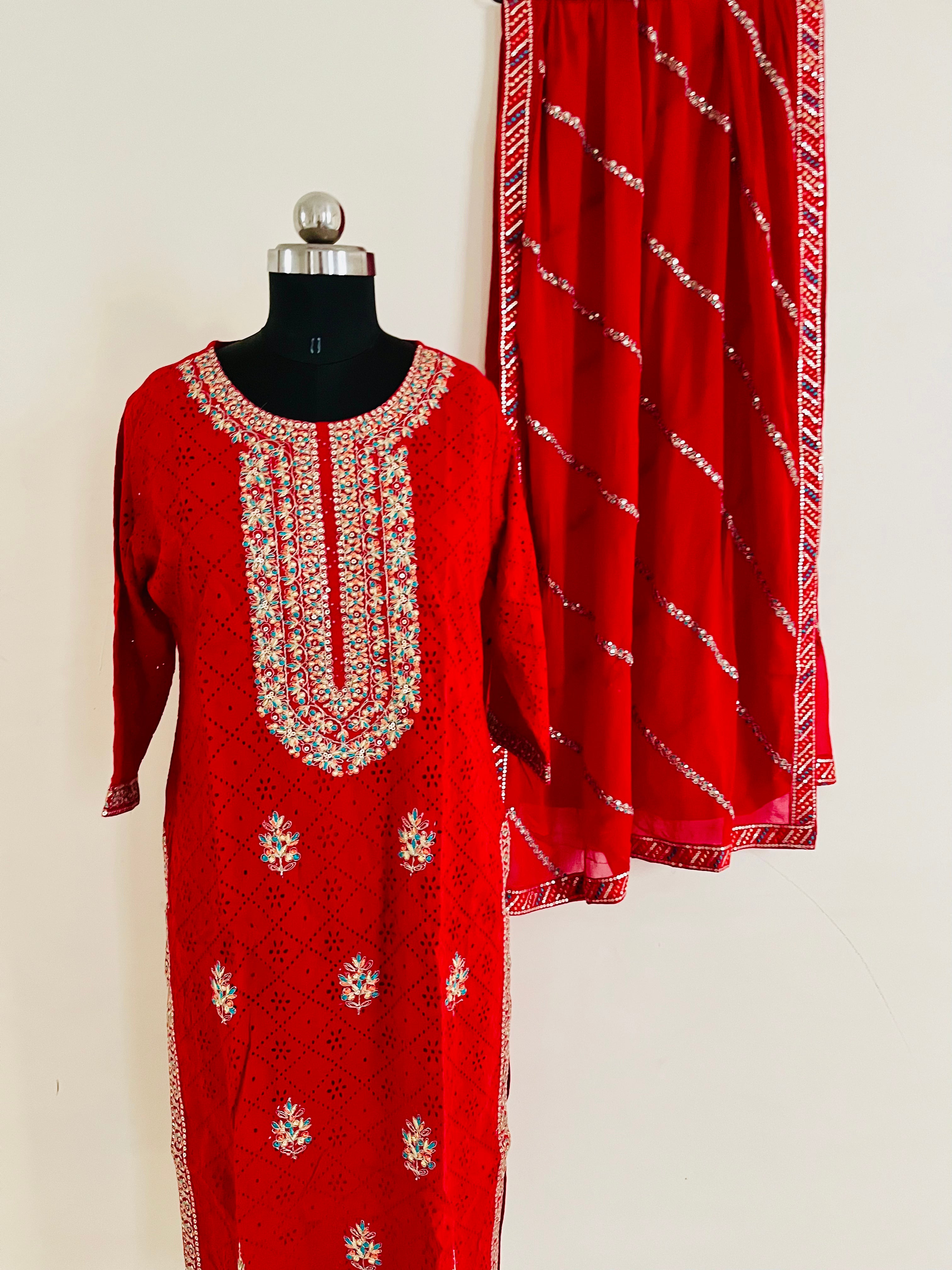 Red Cotton Cutwork Kurta Set With Dupatta by Indian Wear with Cotton, Cutwork, Ethnic Wear, Kurta Pant Sets, Kurta Set with Dupattas, Natural, Red, Regular Fit, Womenswear at Kamakhyaa for sustainable fashion