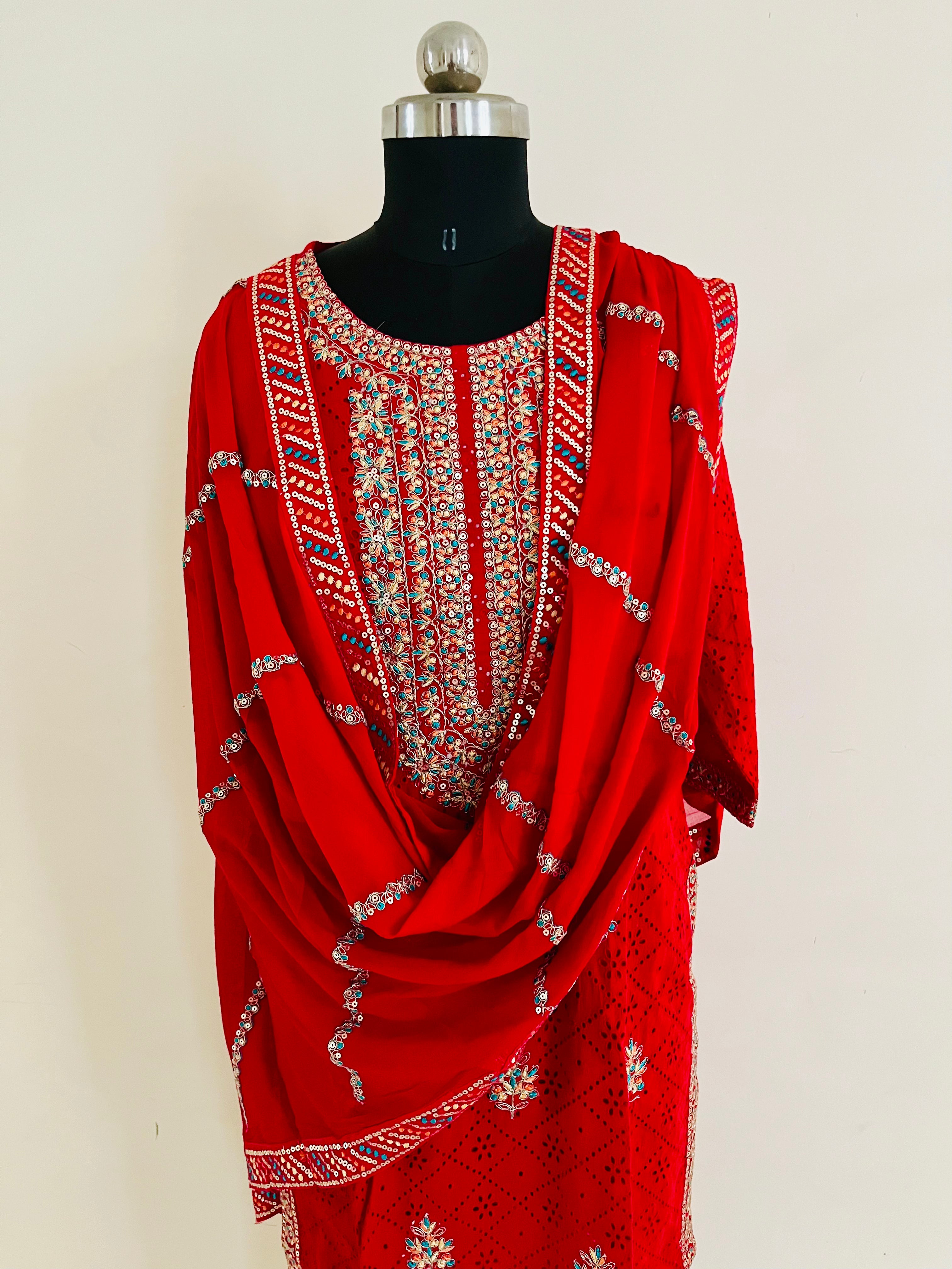 Red Cotton Cutwork Kurta Set With Dupatta by Indian Wear with Cotton, Cutwork, Ethnic Wear, Kurta Pant Sets, Kurta Set with Dupattas, Natural, Red, Regular Fit, Womenswear at Kamakhyaa for sustainable fashion