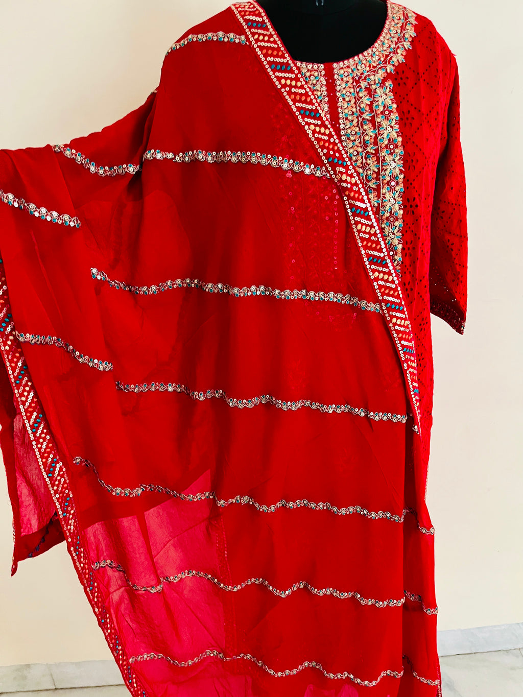 Red Cotton Cutwork Kurta Set With Dupatta by Indian Wear with Cotton, Cutwork, Ethnic Wear, Kurta Pant Sets, Kurta Set with Dupattas, Natural, Red, Regular Fit, Womenswear at Kamakhyaa for sustainable fashion