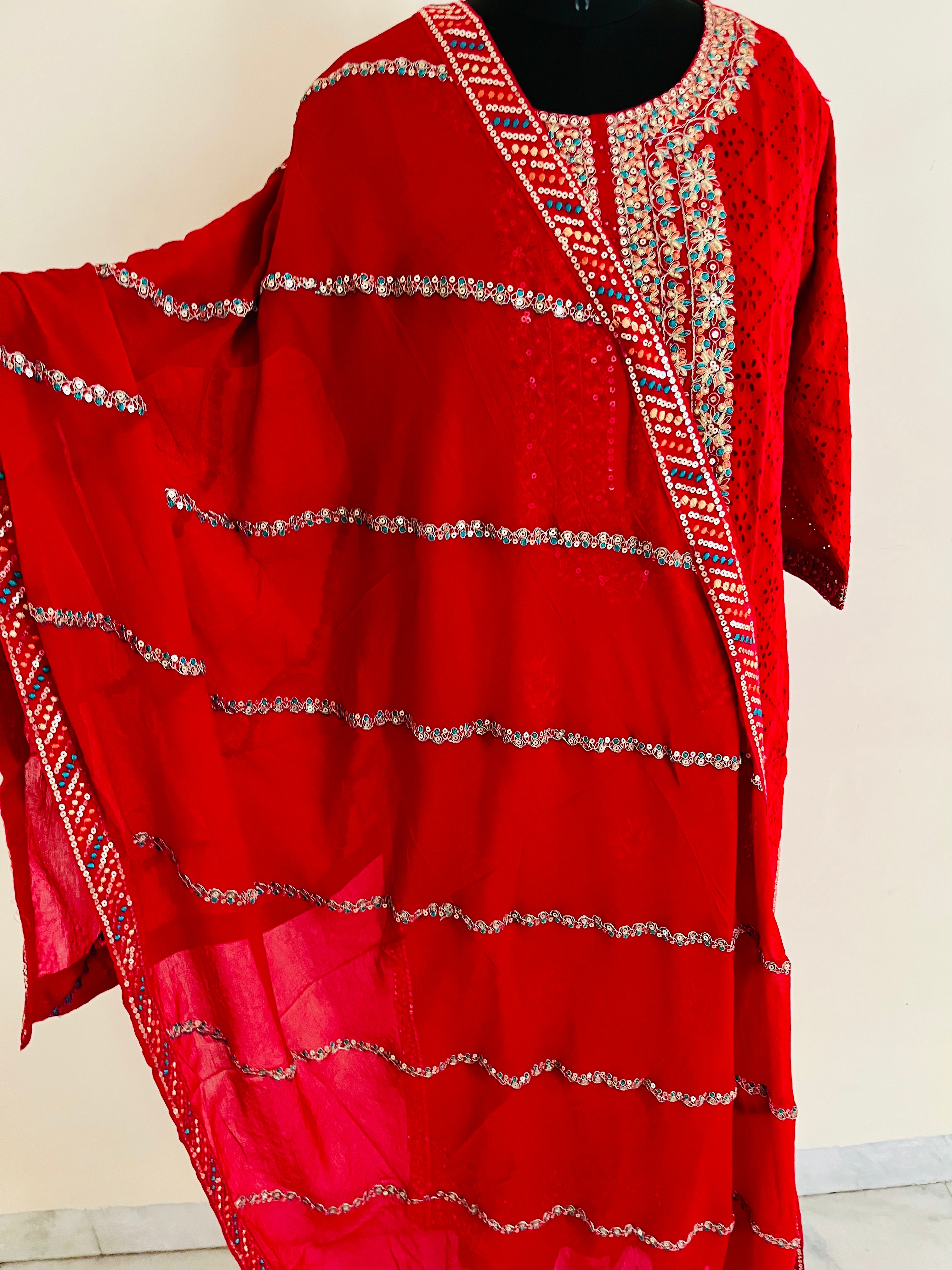 Red Cotton Cutwork Kurta Set With Dupatta by Indian Wear with Cotton, Cutwork, Ethnic Wear, Kurta Pant Sets, Kurta Set with Dupattas, Natural, Red, Regular Fit, Womenswear at Kamakhyaa for sustainable fashion